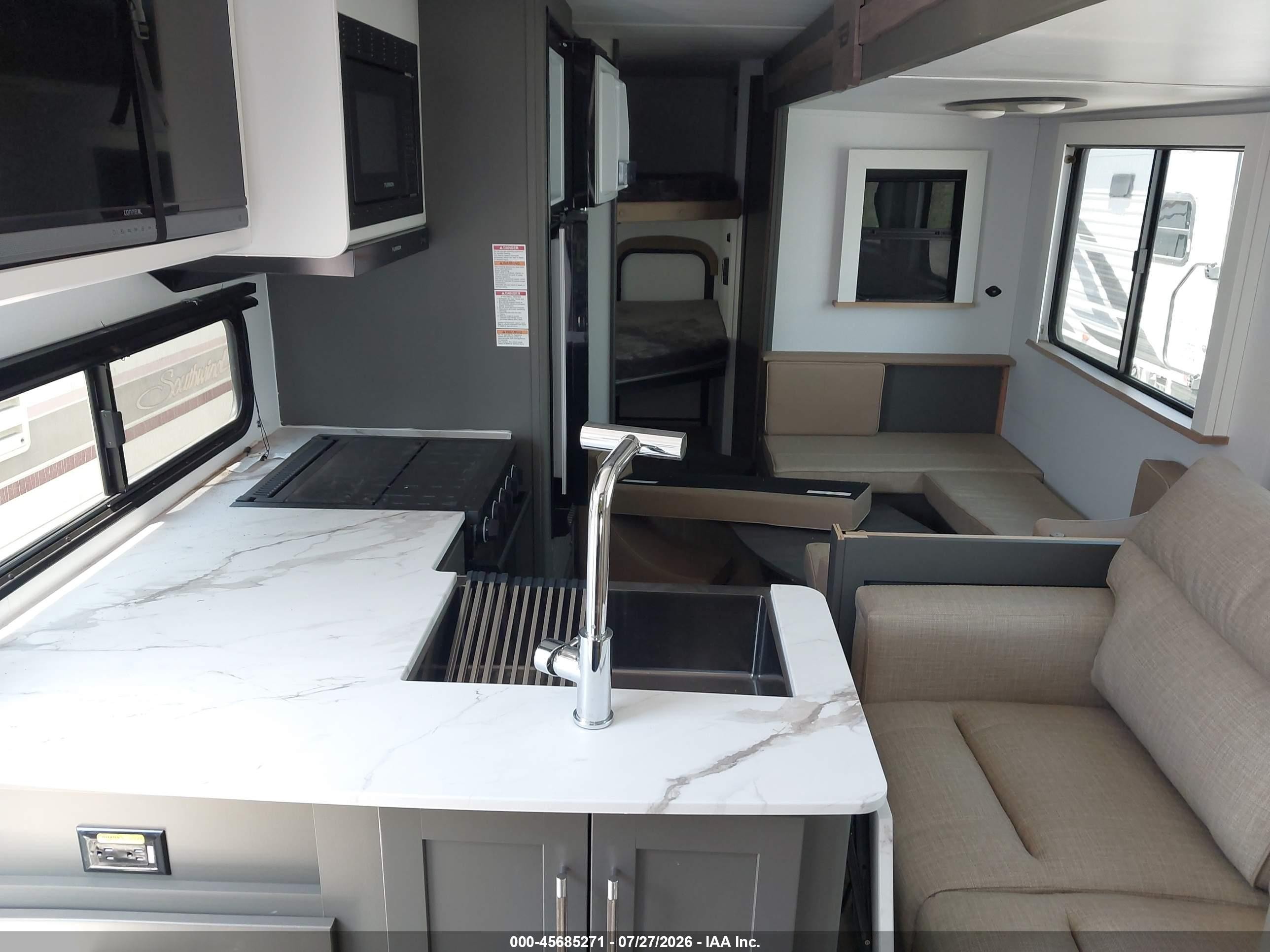 2025 Keystone Rv Bullet VIN 4YDTBLM27SD430332 IAAI salvage auction — Hail, Certificate Of Title (Nebraska), sold $7,900 on 2026-09-18 (photo 5)