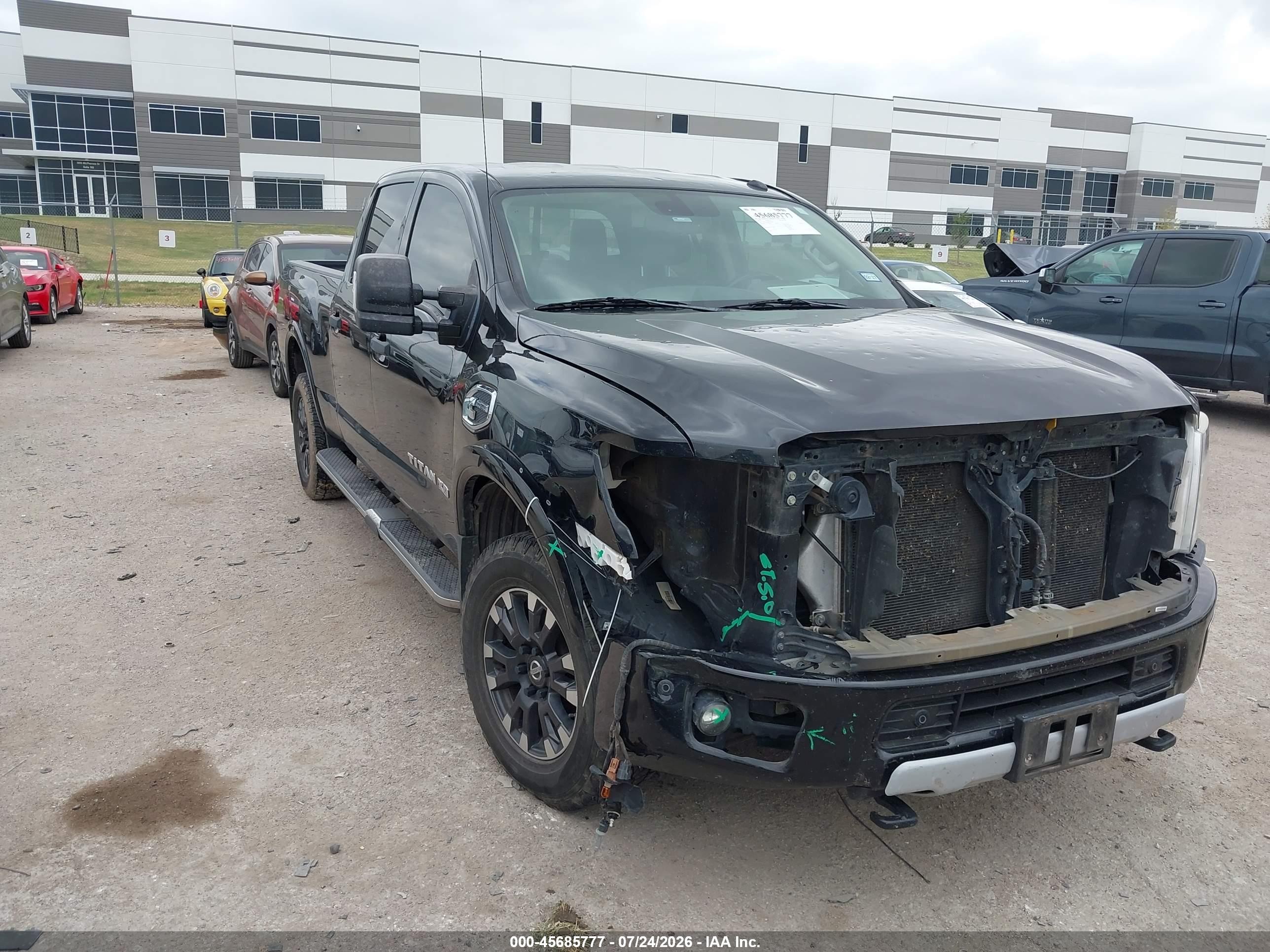 2019 Nissan Titan VIN 1N6BA1F40KN509529 — IAAI salvage auction photo