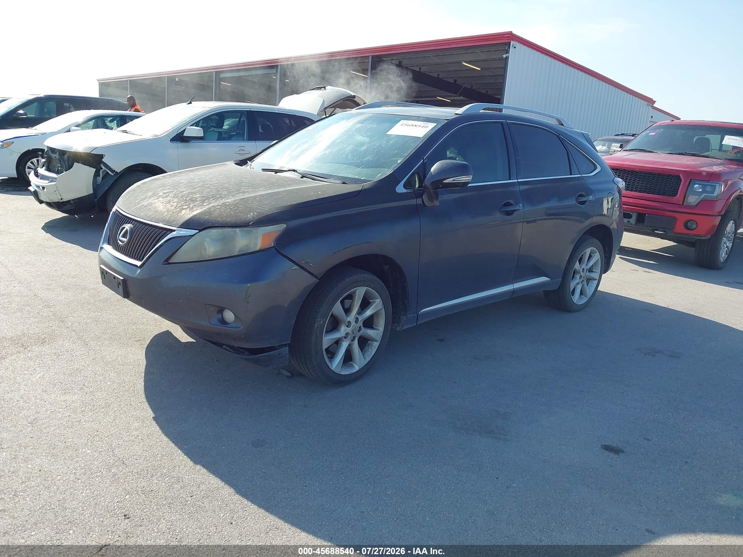 2010 Lexus Rx VIN 2T2BK1BAXAC028387 IAAI salvage auction — Hail, Certificate Of Title (Nebraska), sold $2,300 on 2026-09-26 (photo 2)