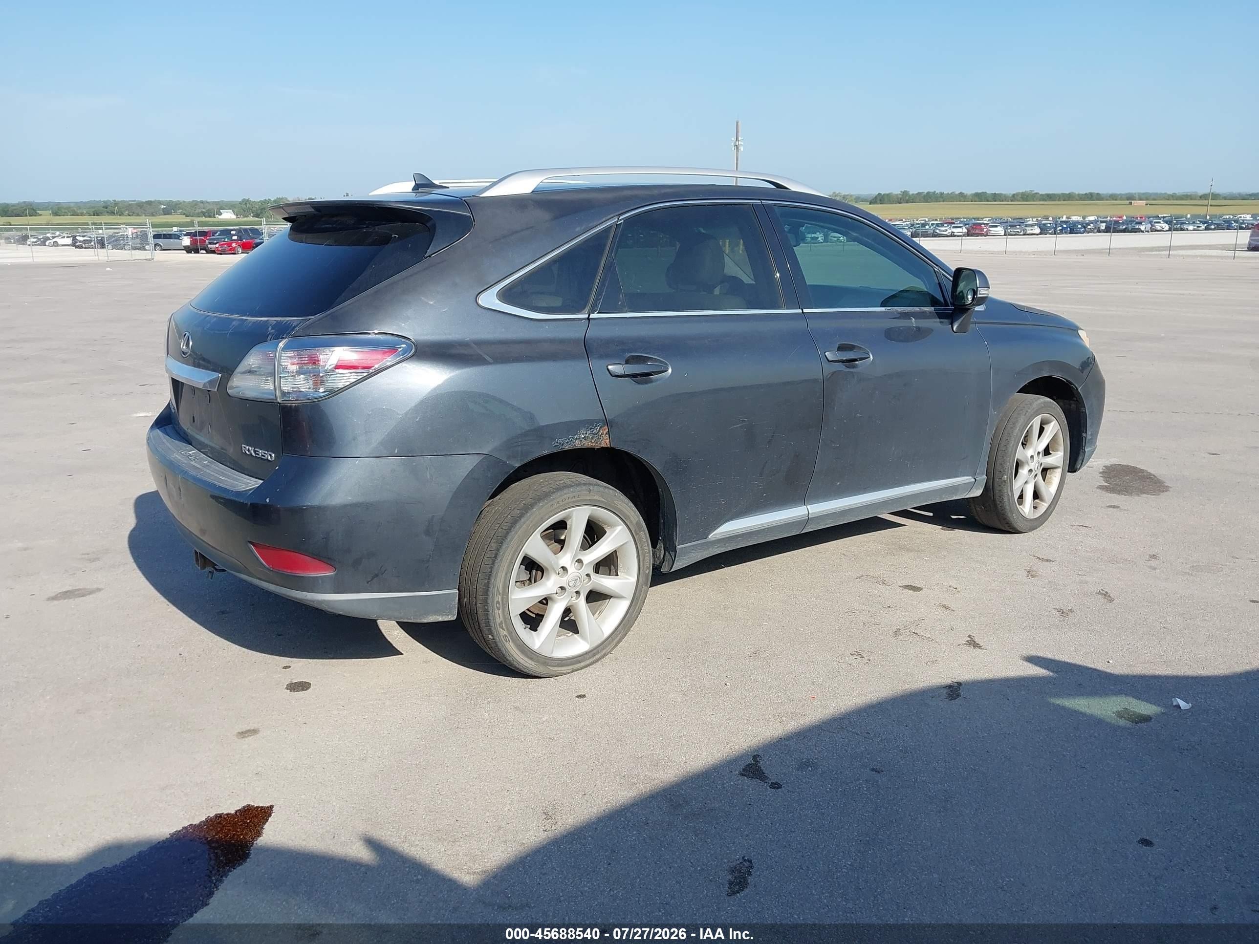 2010 Lexus Rx VIN 2T2BK1BAXAC028387 IAAI salvage auction — Hail, Certificate Of Title (Nebraska), sold $2,300 on 2026-09-26 (photo 4)