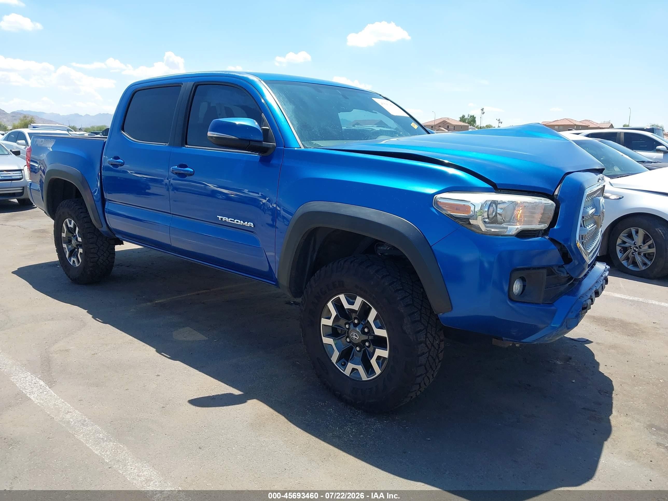 2016 Toyota Tacoma VIN 3TMCZ5AN0GM018757 — IAAI salvage auction photo