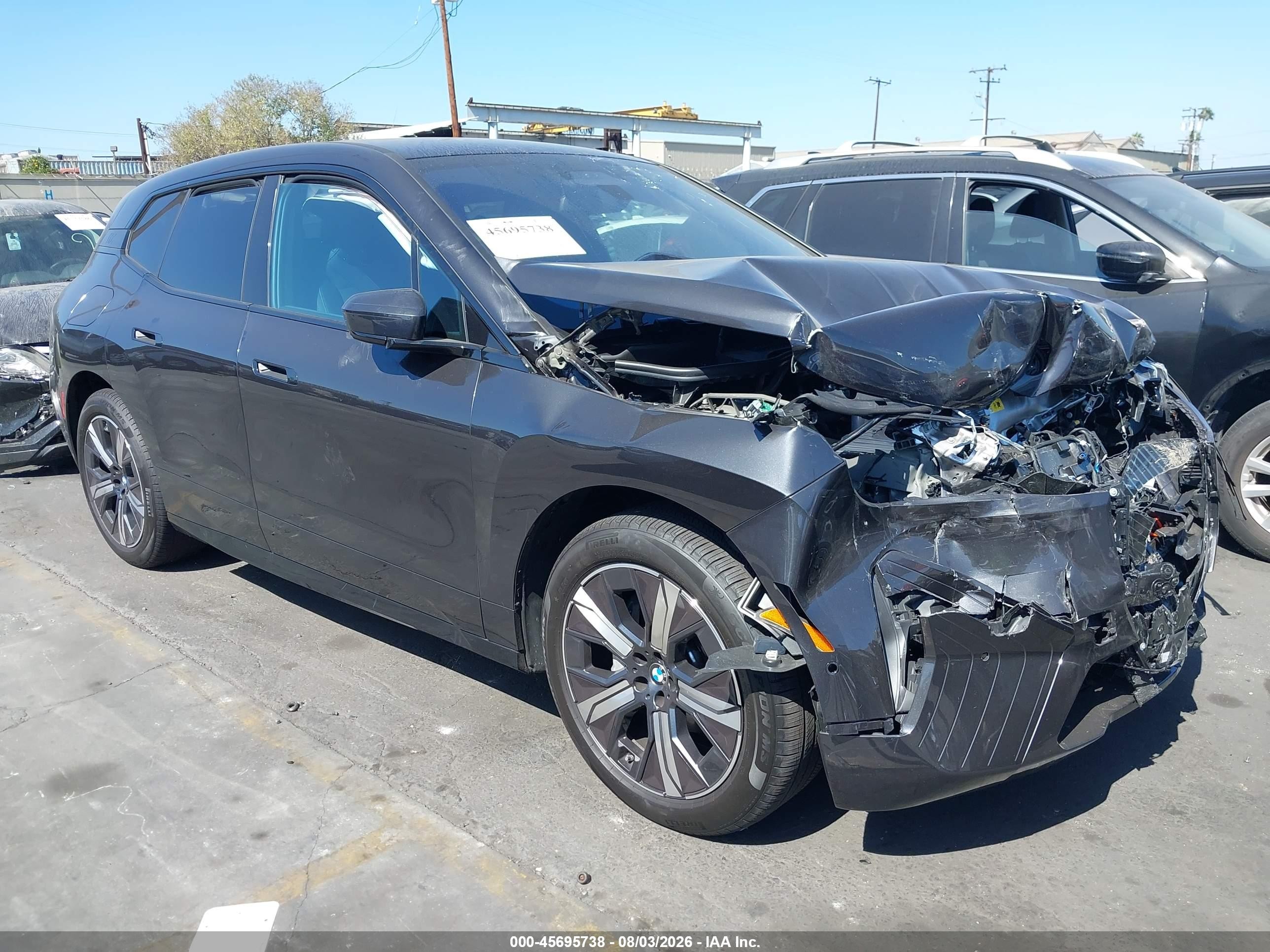 2026 BMW iX VIN WB543CF00TCW76142 — IAAI salvage auction photo
