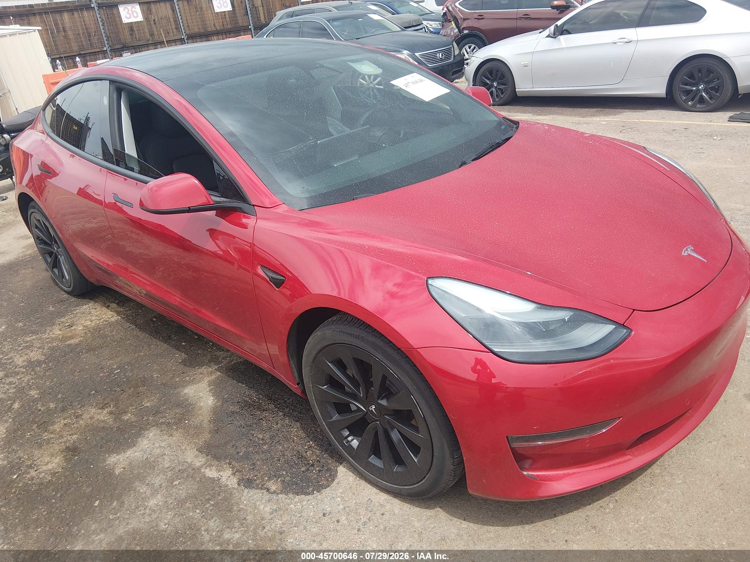 2022 Tesla Model 3 VIN 5YJ3E1EB7NF131899 — IAAI salvage auction photo