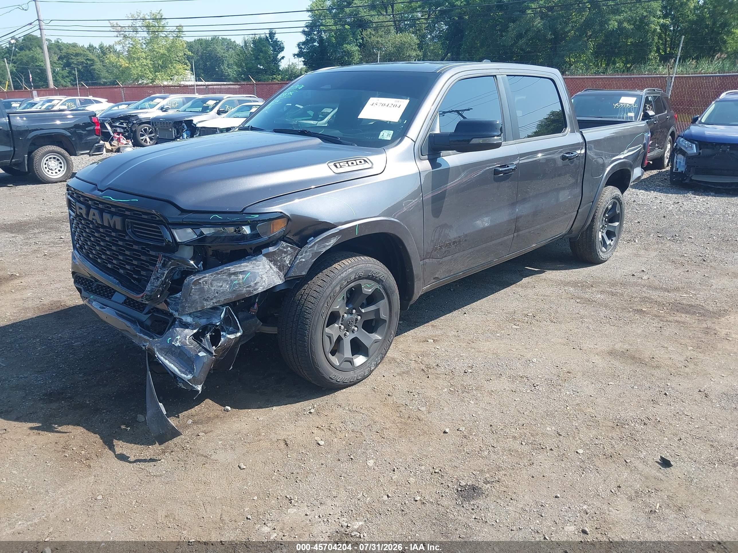 2026 Ram 1500 VIN 1C6SRFFT1TN209216 IAAI salvage auction — Front & Rear, Salvage (Idaho), sold $26,500 on 2026-09-30 (photo 2)