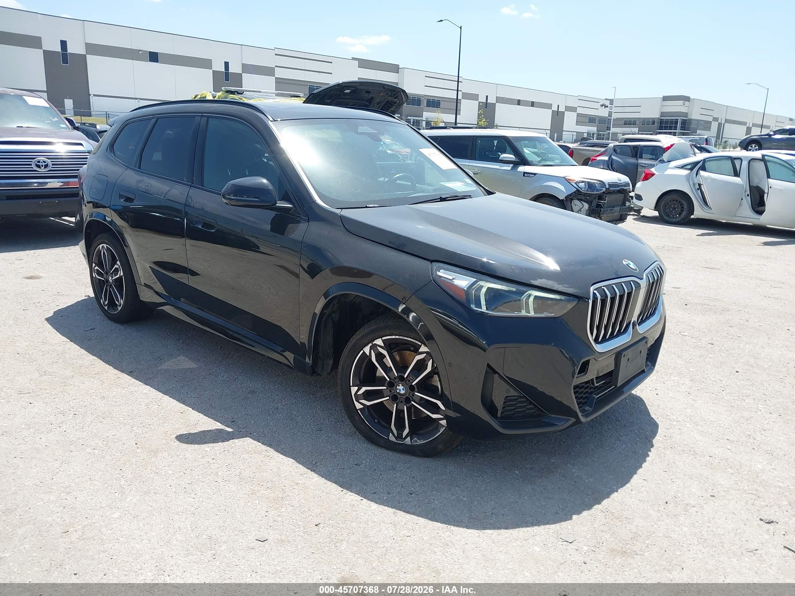2023 BMW X1 VIN WBX73EF04P5W54414 — IAAI salvage auction photo