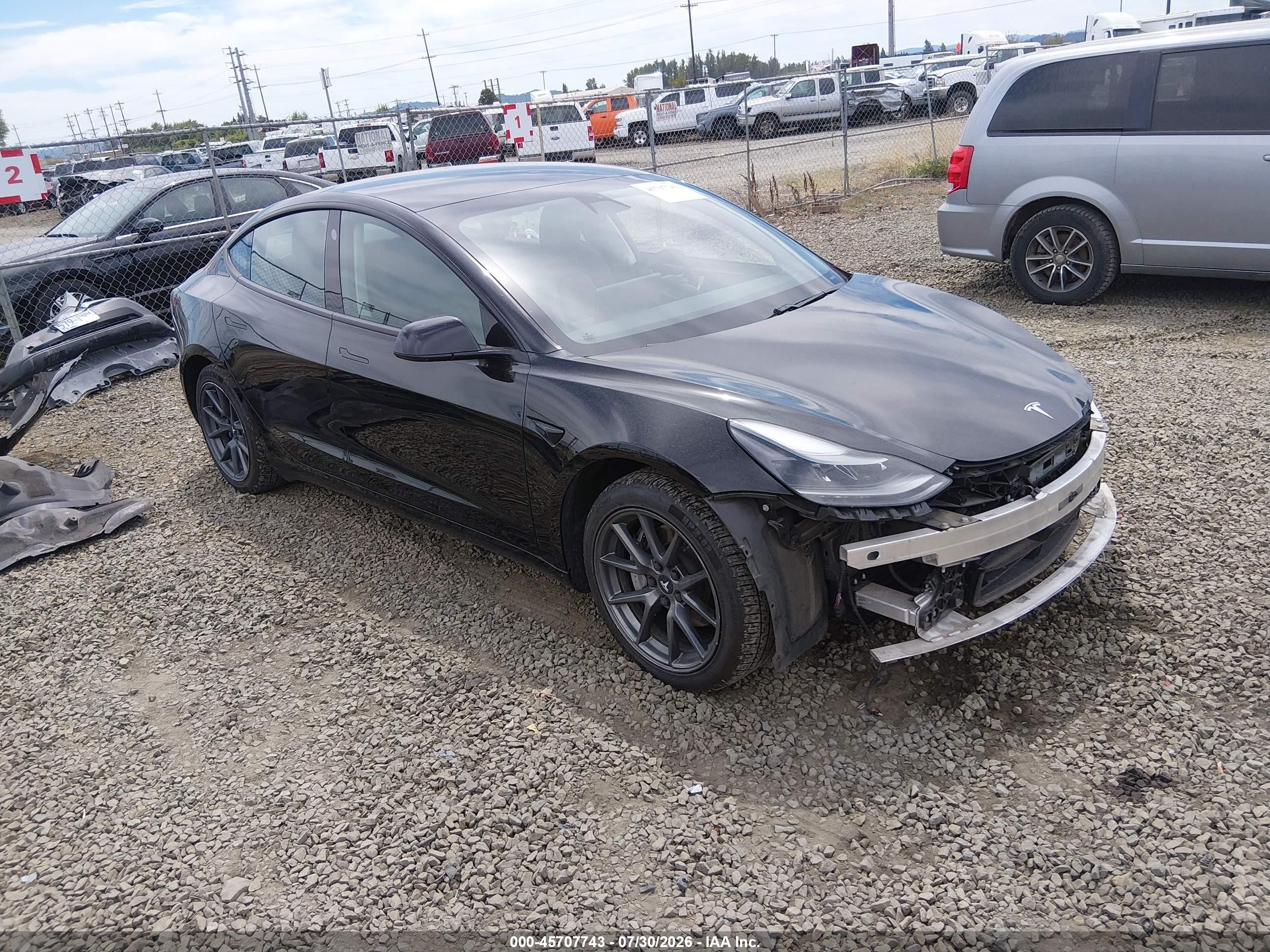 2021 Tesla Model 3 VIN 5YJ3E1EB3MF903104 — IAAI salvage auction photo