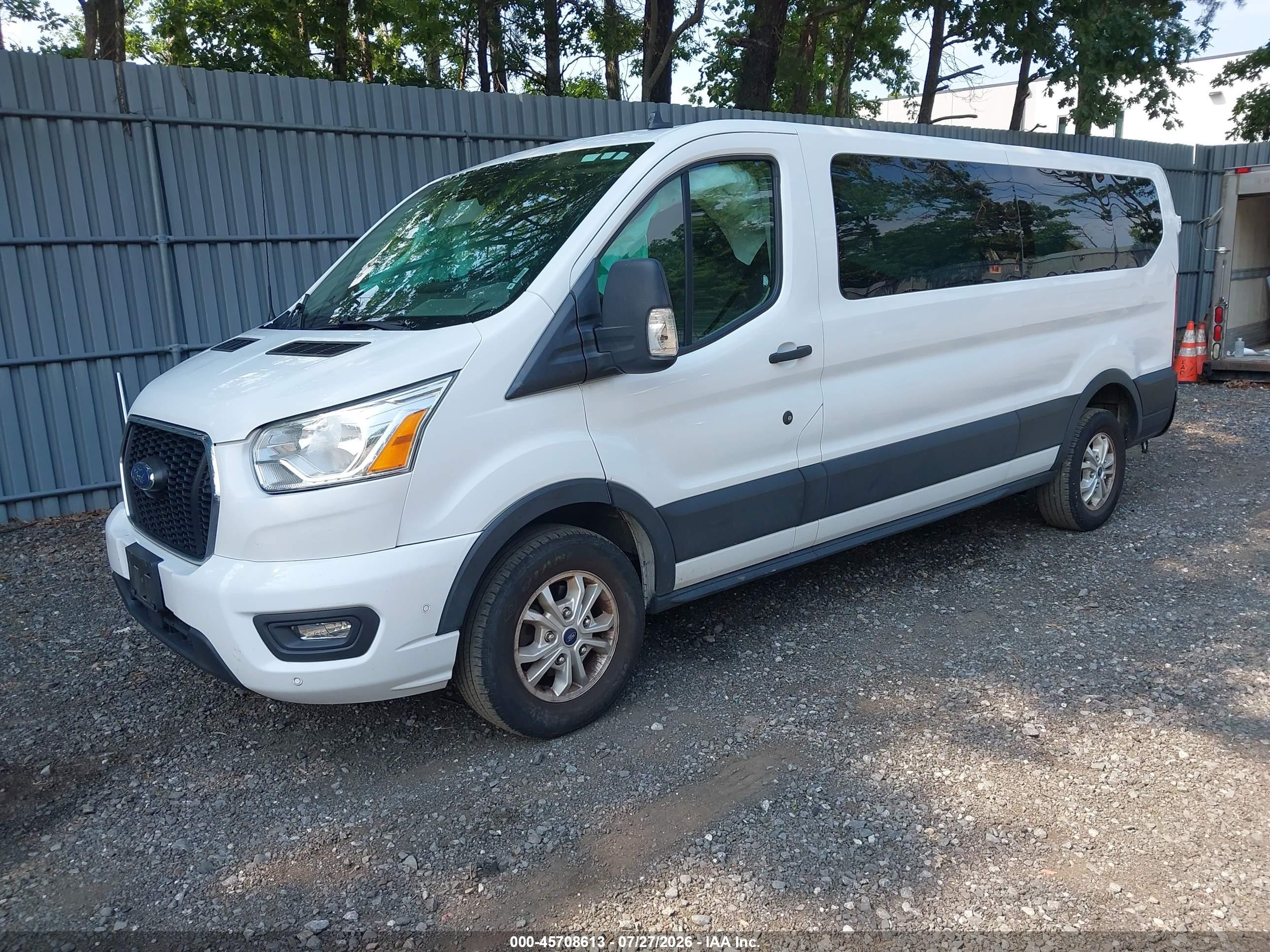 2021 Ford Transit VIN 1FBAX2YG1MKA52054 IAAI salvage auction — Side, Salvage (Idaho), sold $7,500 on 2026-09-05 (photo 2)