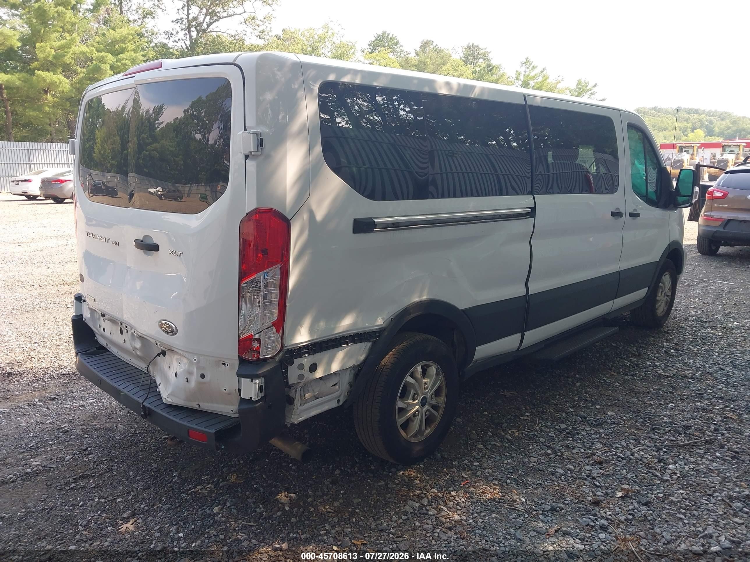 2021 Ford Transit VIN 1FBAX2YG1MKA52054 IAAI salvage auction — Side, Salvage (Idaho), sold $7,500 on 2026-09-05 (photo 4)