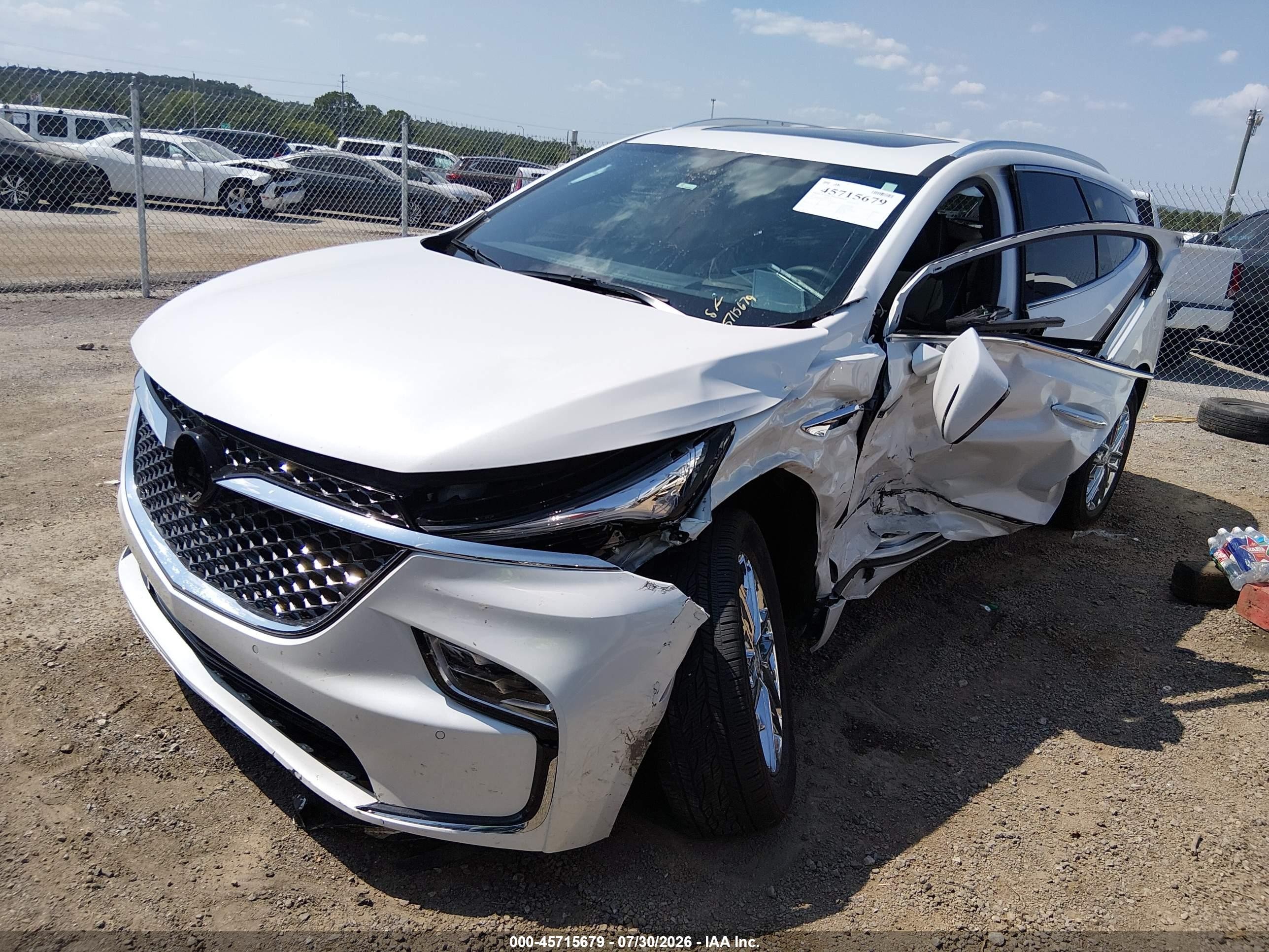 2023 Buick Enclave VIN 5GAERDKWXPJ167217 IAAI salvage auction — Side, Clear (Oklahoma), sold $5,200 on 2026-10-08 (photo 2)