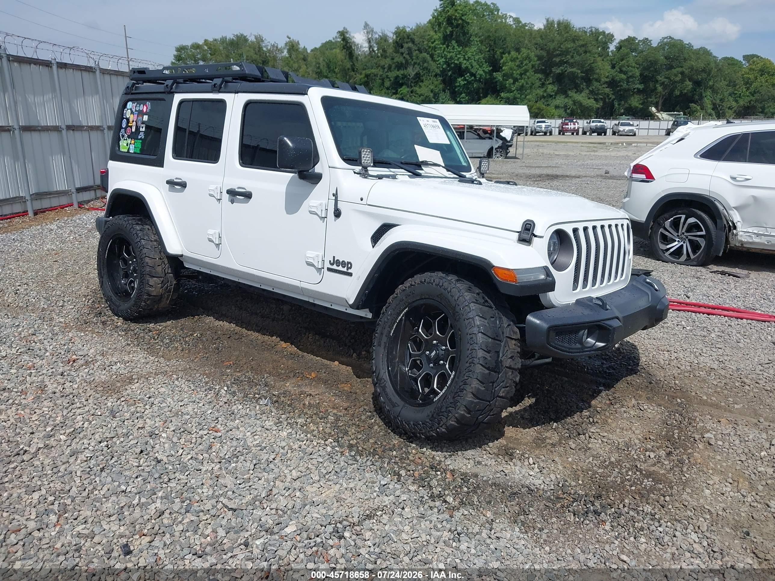 2021 Jeep Wrangler Unlimited VIN 1C4HJXDM6MW557214 — IAAI salvage auction photo