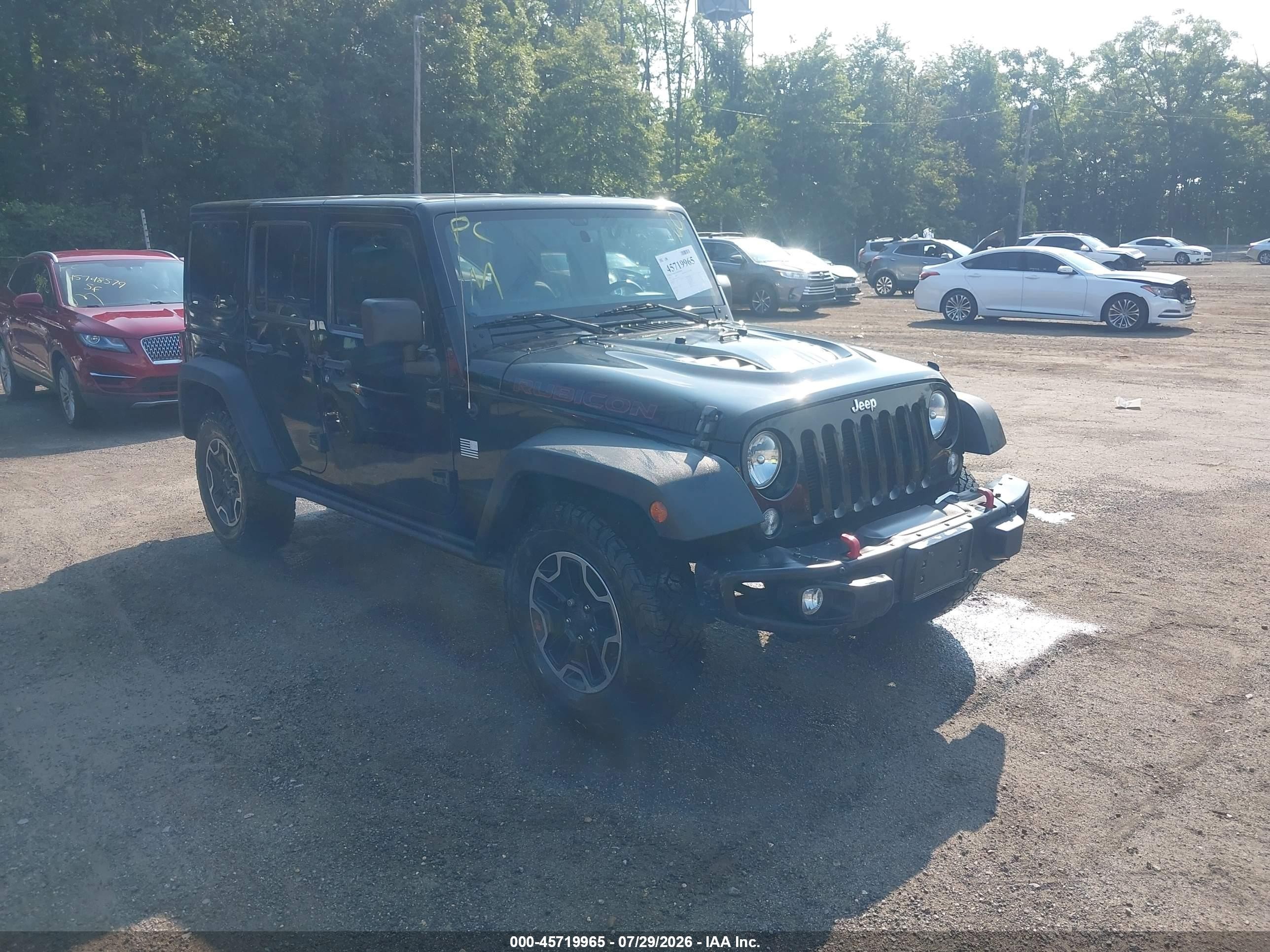 2014 Jeep Wrangler Unlimited VIN 1C4HJWFG4EL205737 — IAAI salvage auction photo