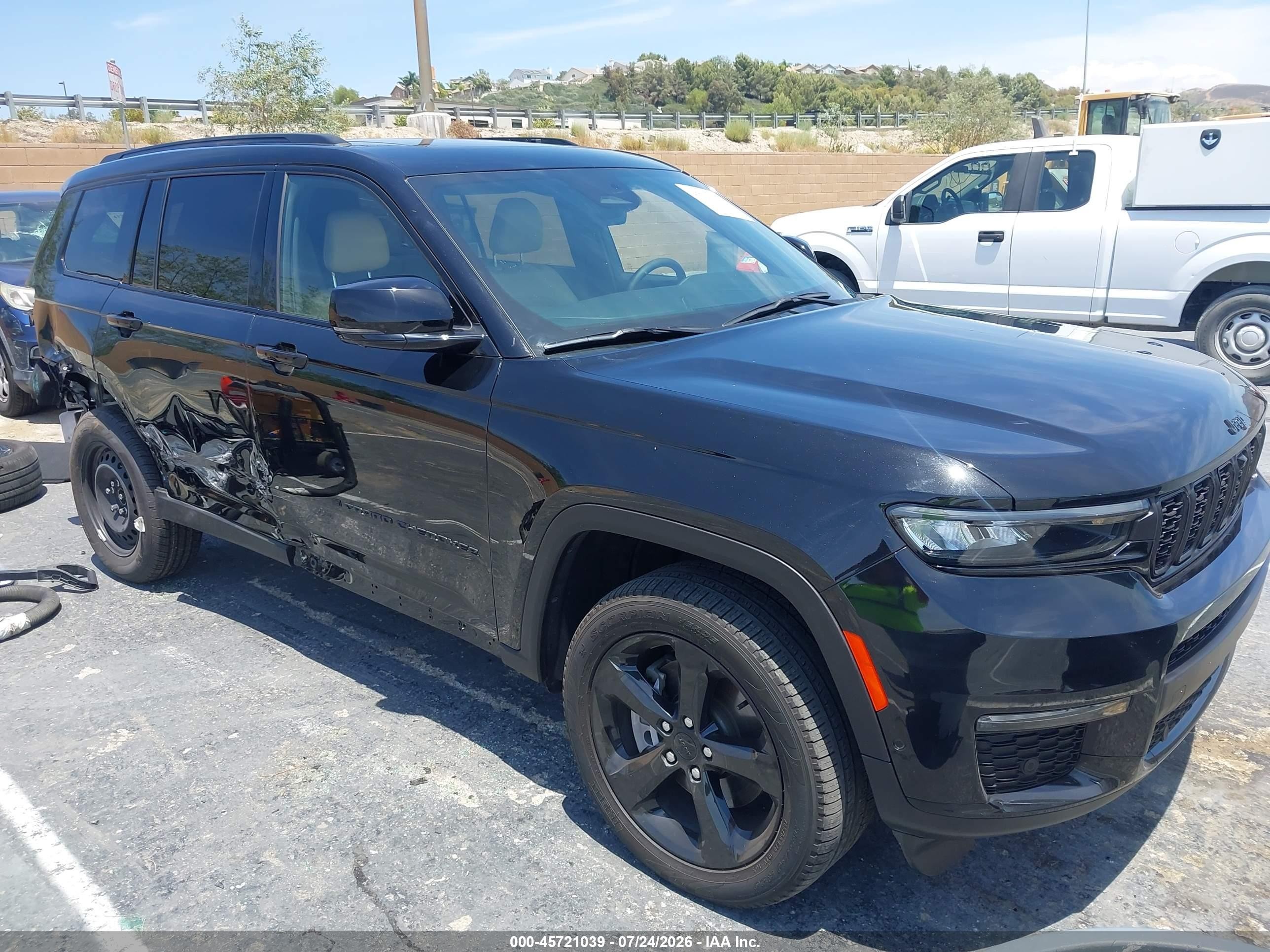 2023 Jeep Grand cherokee VIN 1C4RJKBG4P8869190 IAAI salvage auction — Side, Salvage (California), sold $13,750 on 2026-09-11 (photo 1)