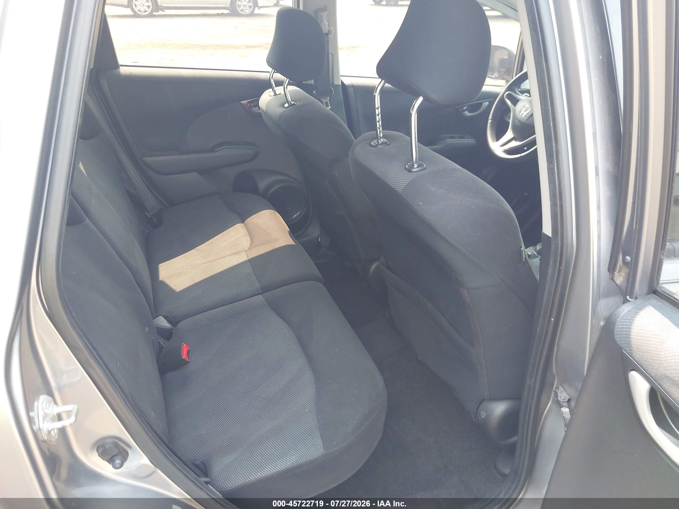 2009 Honda Fit VIN JHMGE88429S065423 IAAI salvage auction — Side, Salvage - Greater Than 75% (Maryland), sold $1,750 on 2026-10-01 (photo 8)