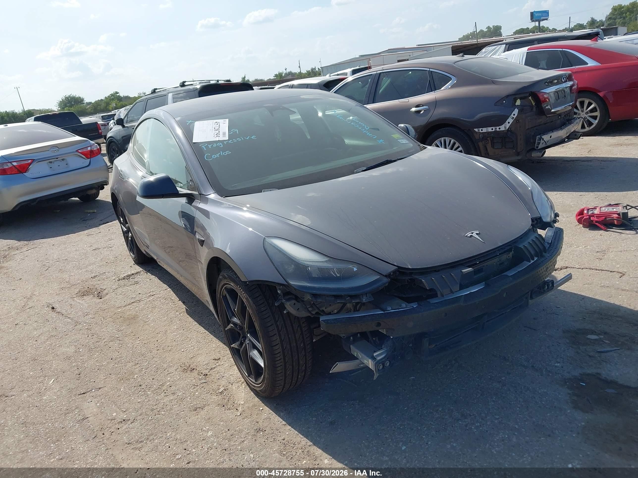 2023 Tesla Model 3 VIN 5YJ3E1EA4PF432639 — IAAI salvage auction photo