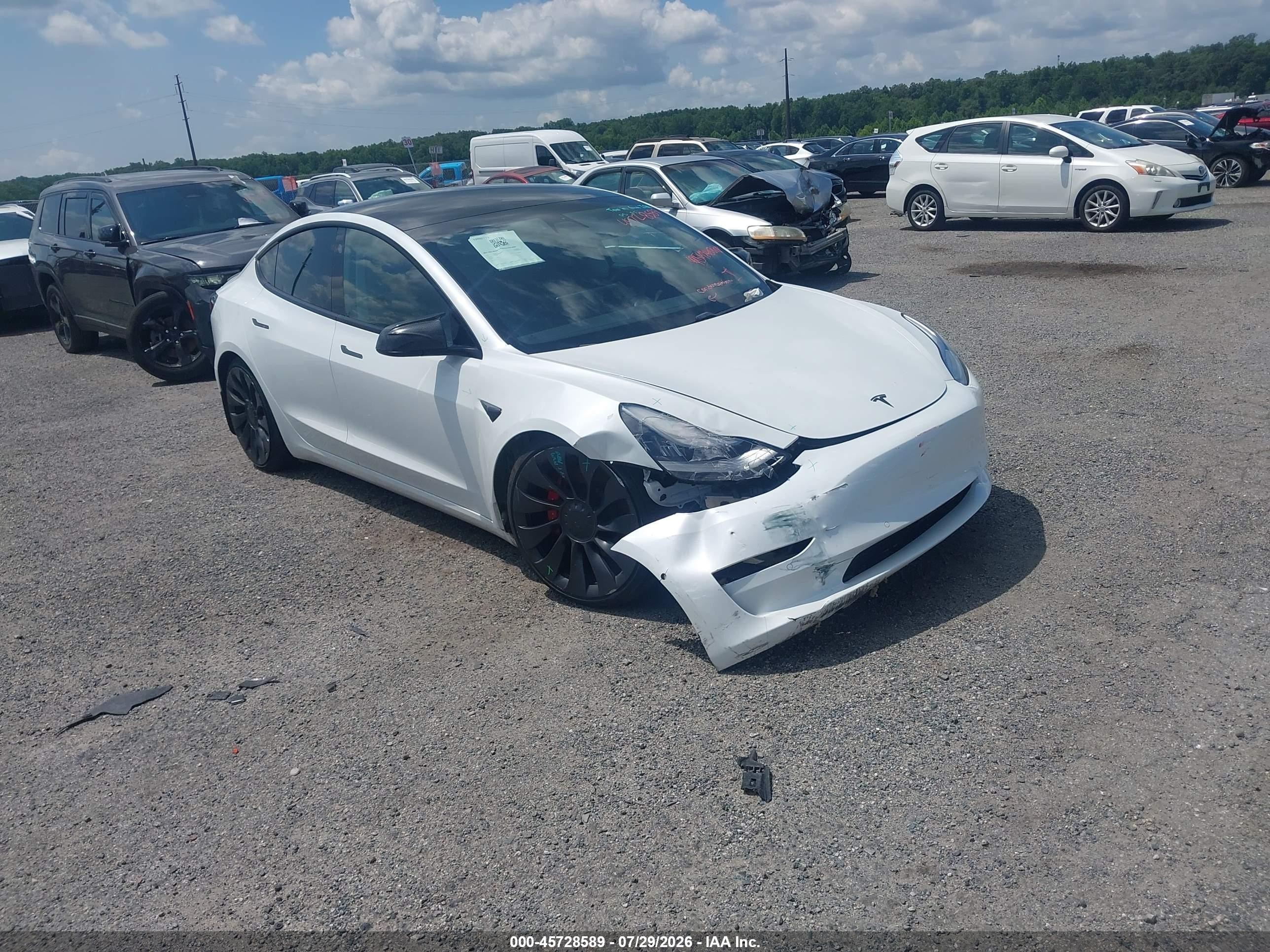 2021 Tesla Model 3 VIN 5YJ3E1EC5MF856294 — IAAI salvage auction photo