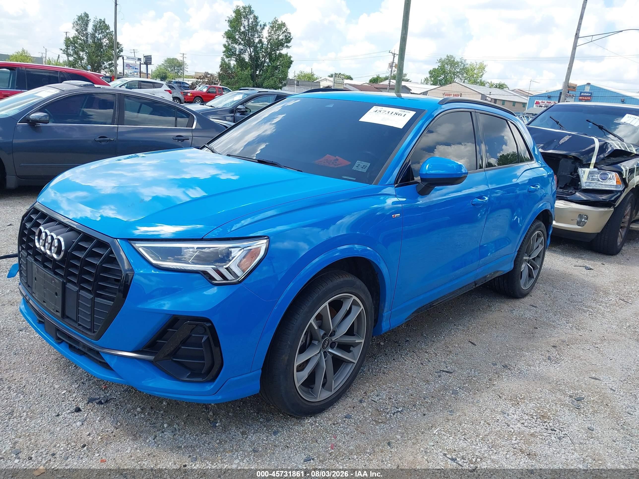 2022 Audi Q3 VIN WA1EECF37N1051663 IAAI salvage auction — Side, Salvage (Illinois), sold $9,200 on 2026-10-01 (photo 2)