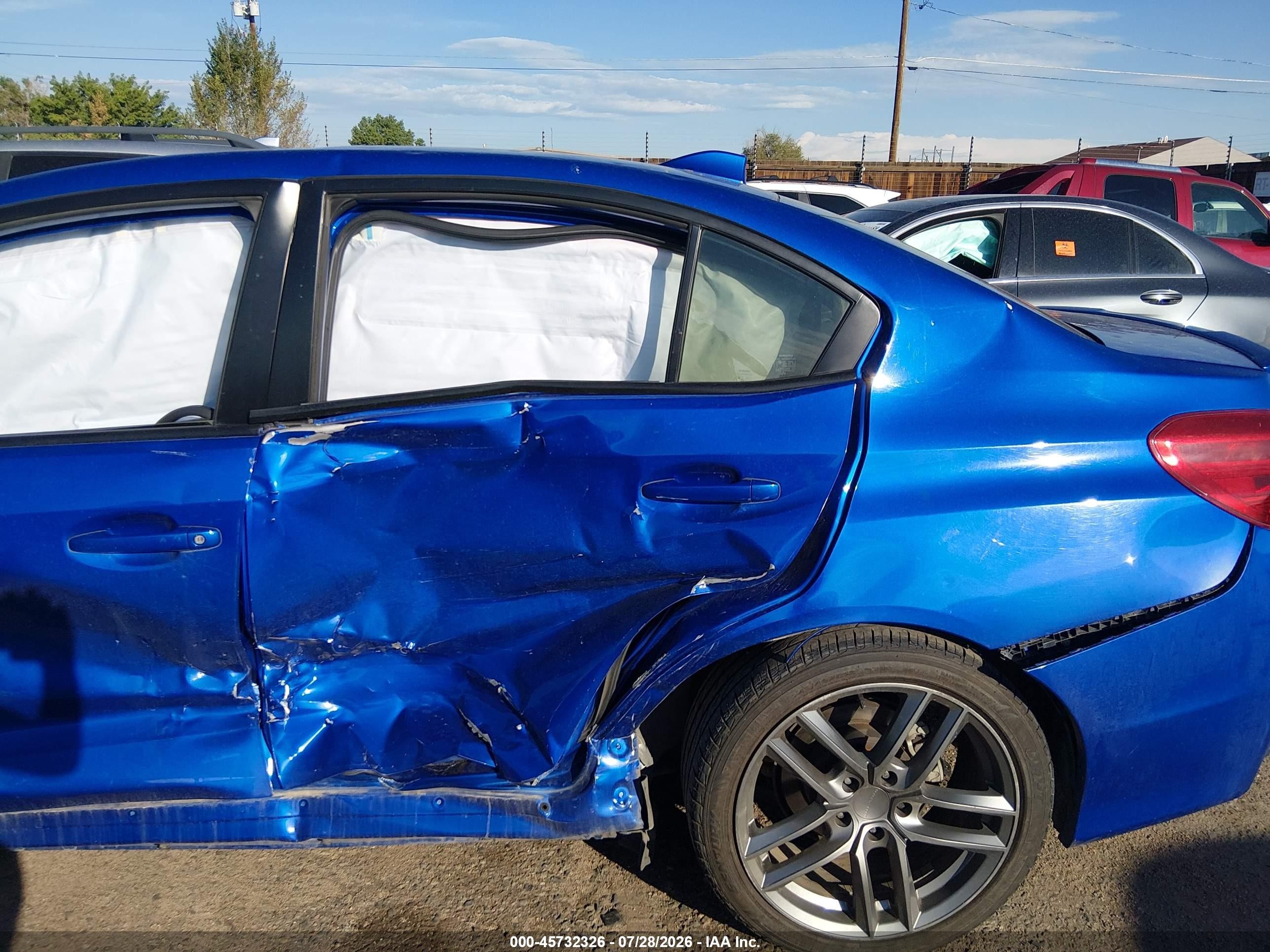 2015 Subaru WRX VIN JF1VA1G62F9832355 IAAI salvage auction — Side, Salvage (Colorado), sold $3,150 on 2026-09-29 (photo 6)