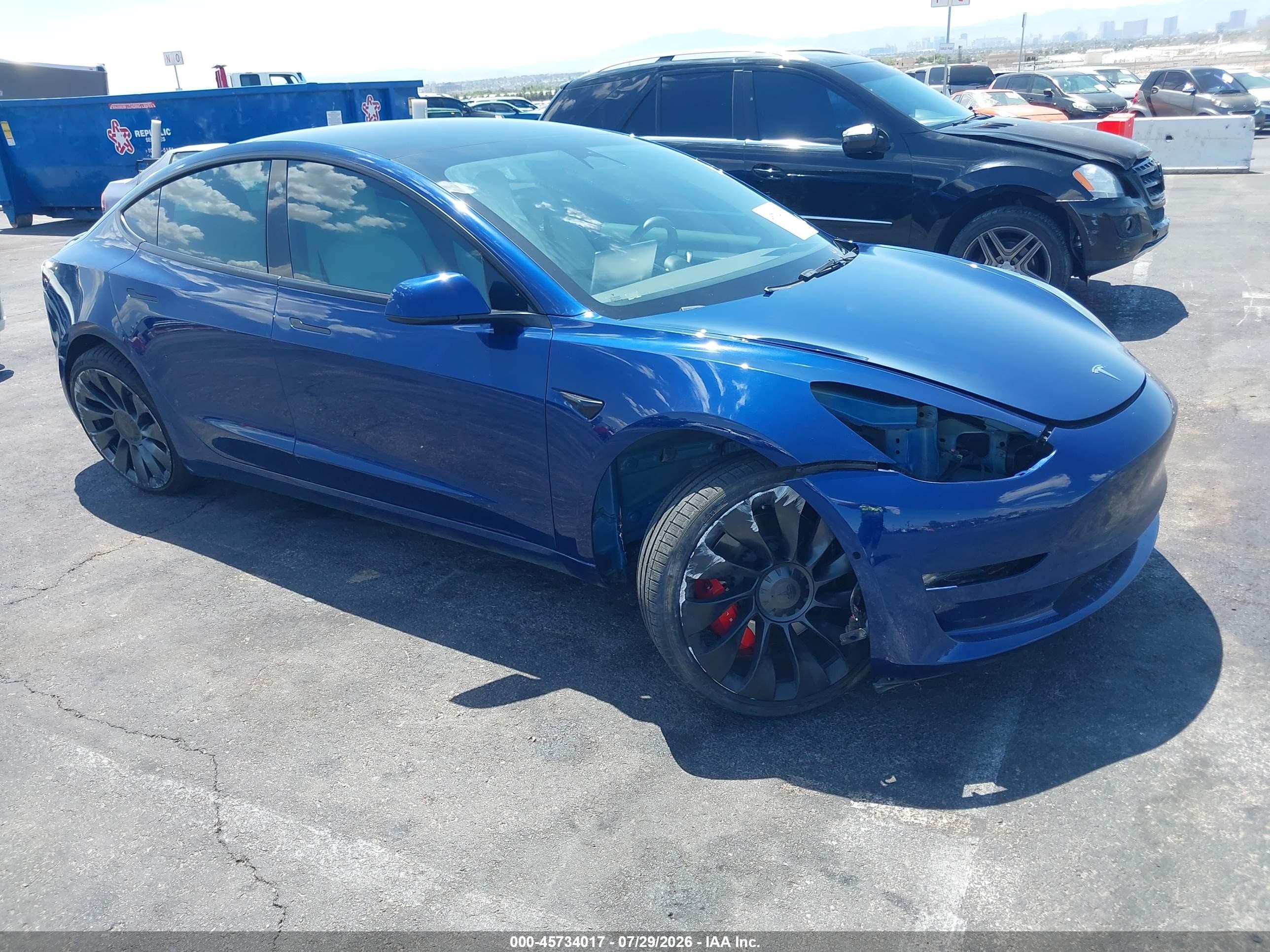 2022 Tesla Model 3 VIN 5YJ3E1EC4NF248381 — IAAI salvage auction photo