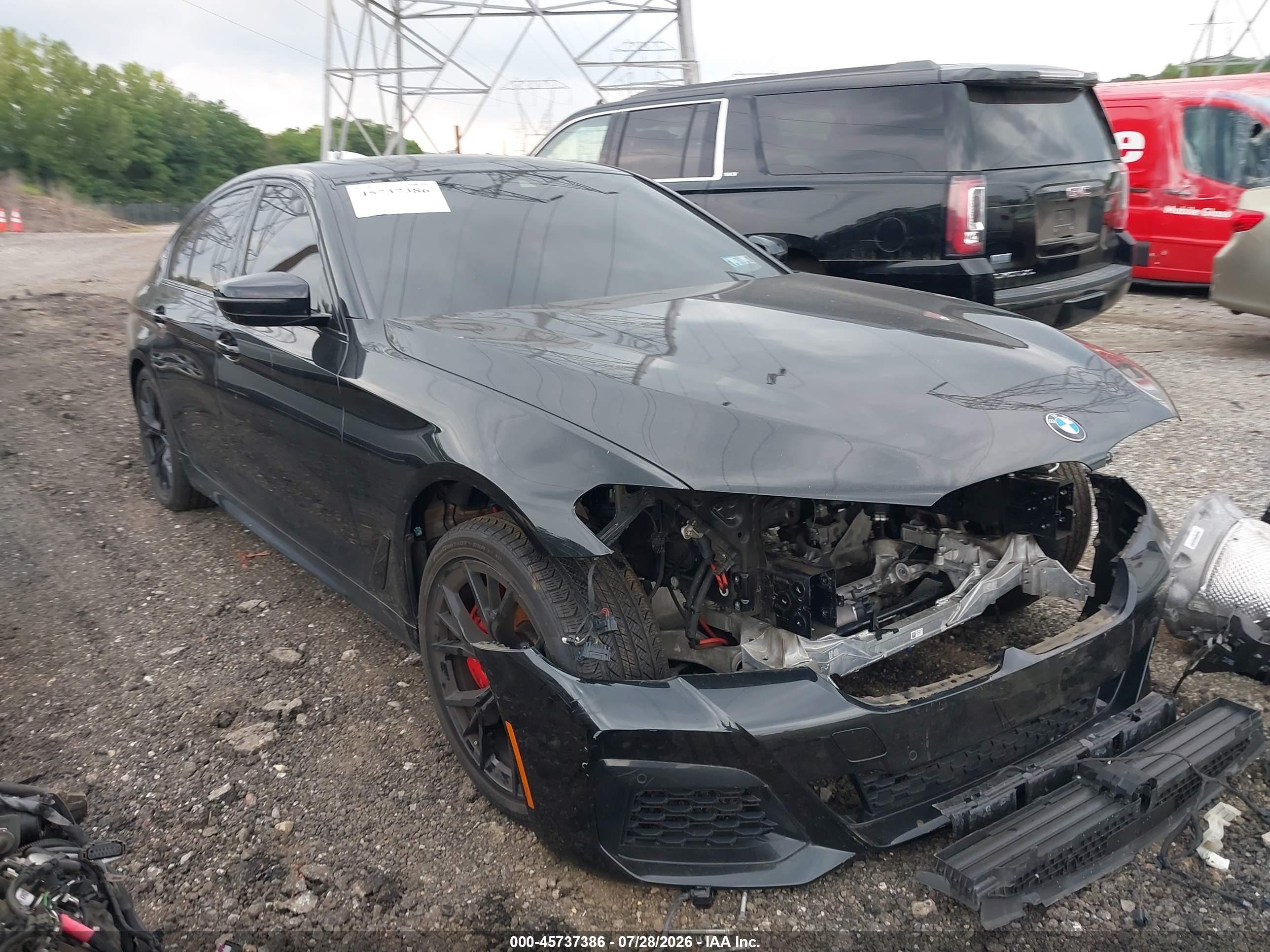 2021 BMW M550i xDrive VIN WBA13BK01MCH52850 — IAAI salvage auction photo