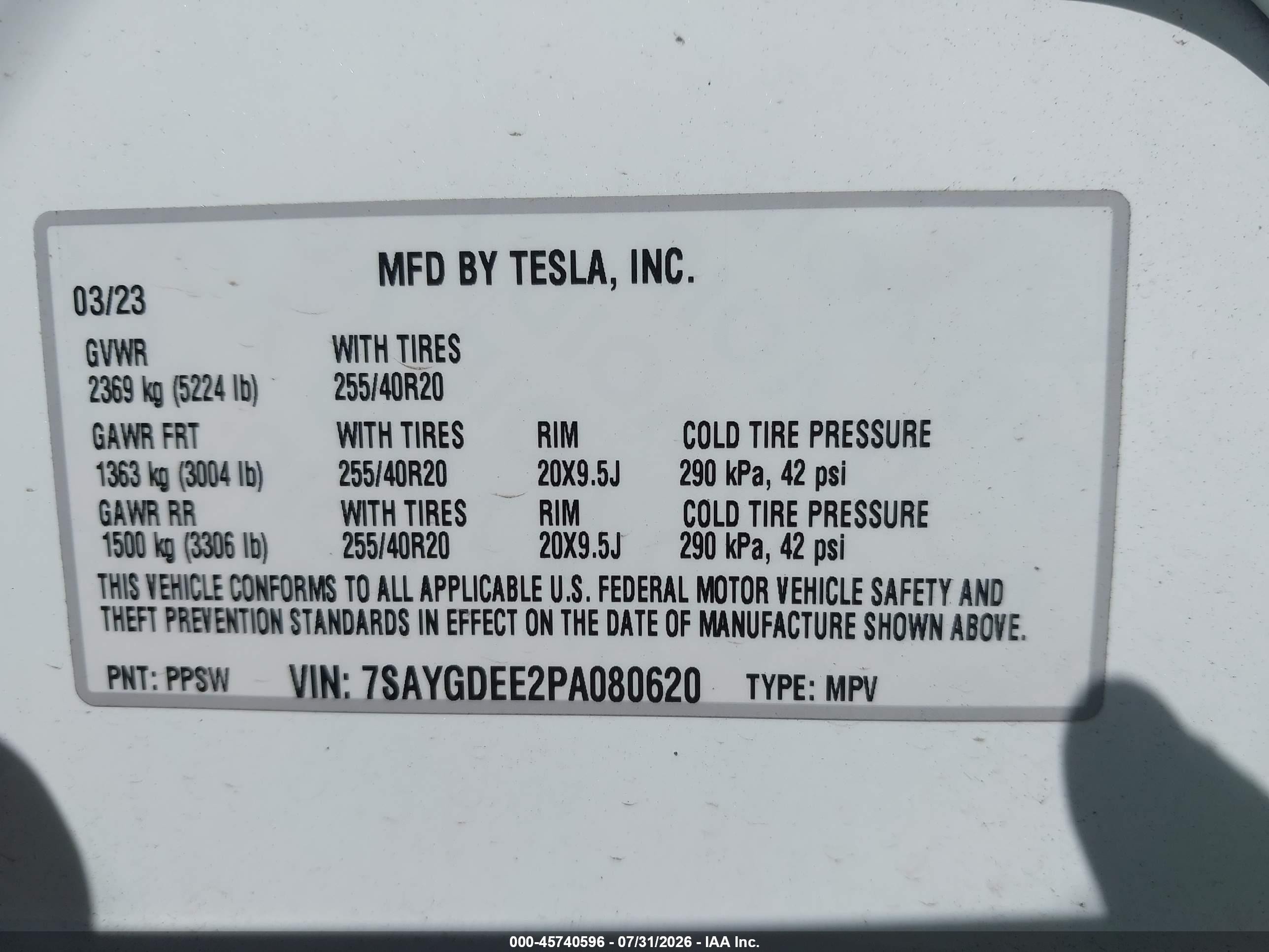 2023 Tesla Model Y VIN 7SAYGDEE2PA080620 IAAI salvage auction — Unknown, Salvage (Massachusetts), sold $10,500 on 2026-10-04 (photo 9)