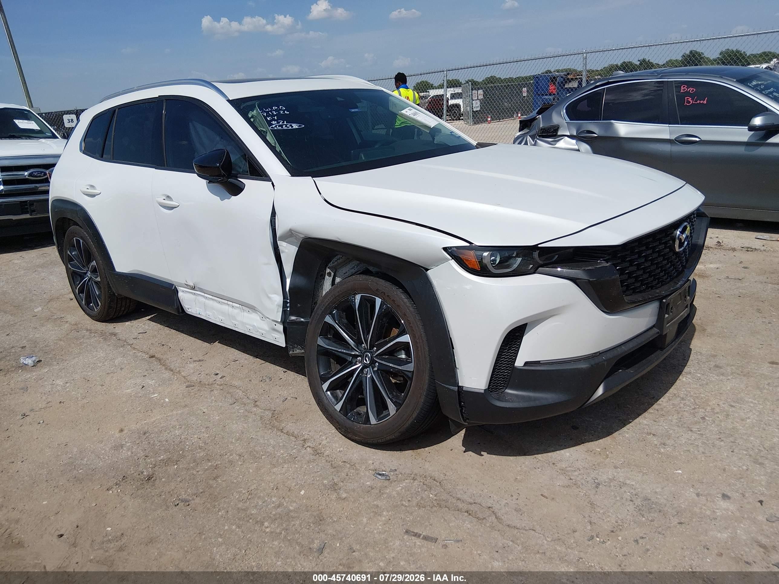 2023 Mazda CX-50 VIN 7MMVABEM8PN137310 — IAAI salvage auction photo