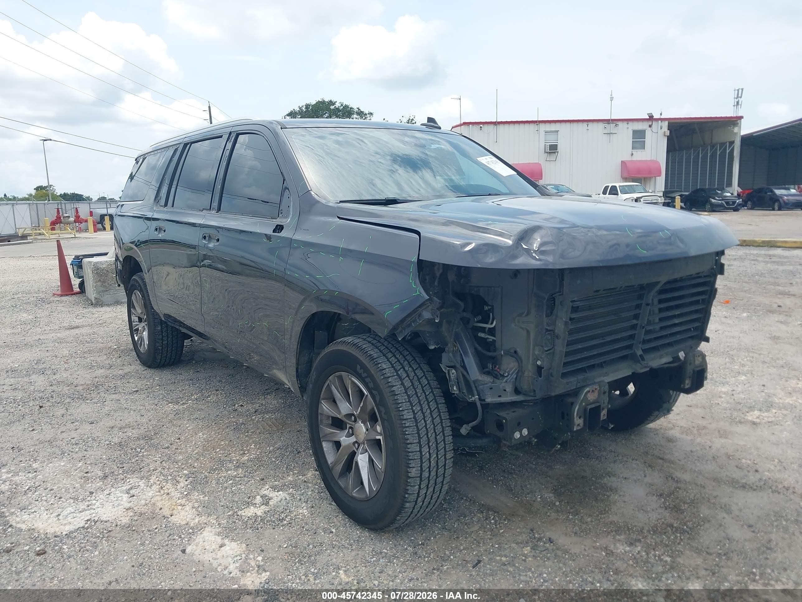 2023 Chevrolet Suburban VIN 1GNSKFKD1PR421437 — IAAI salvage auction photo