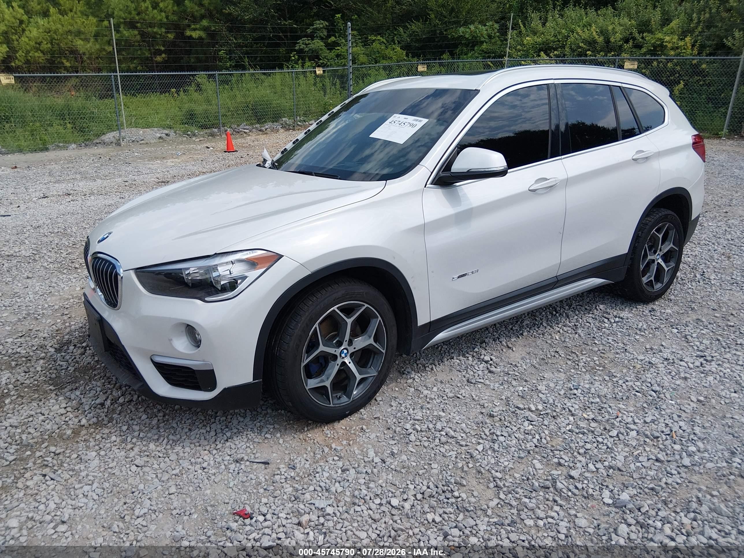 2018 BMW X1 VIN WBXHU7C30J5H43077 IAAI salvage auction — Side, Salvage (Alabama), sold $3,000 on 2026-10-07 (photo 2)