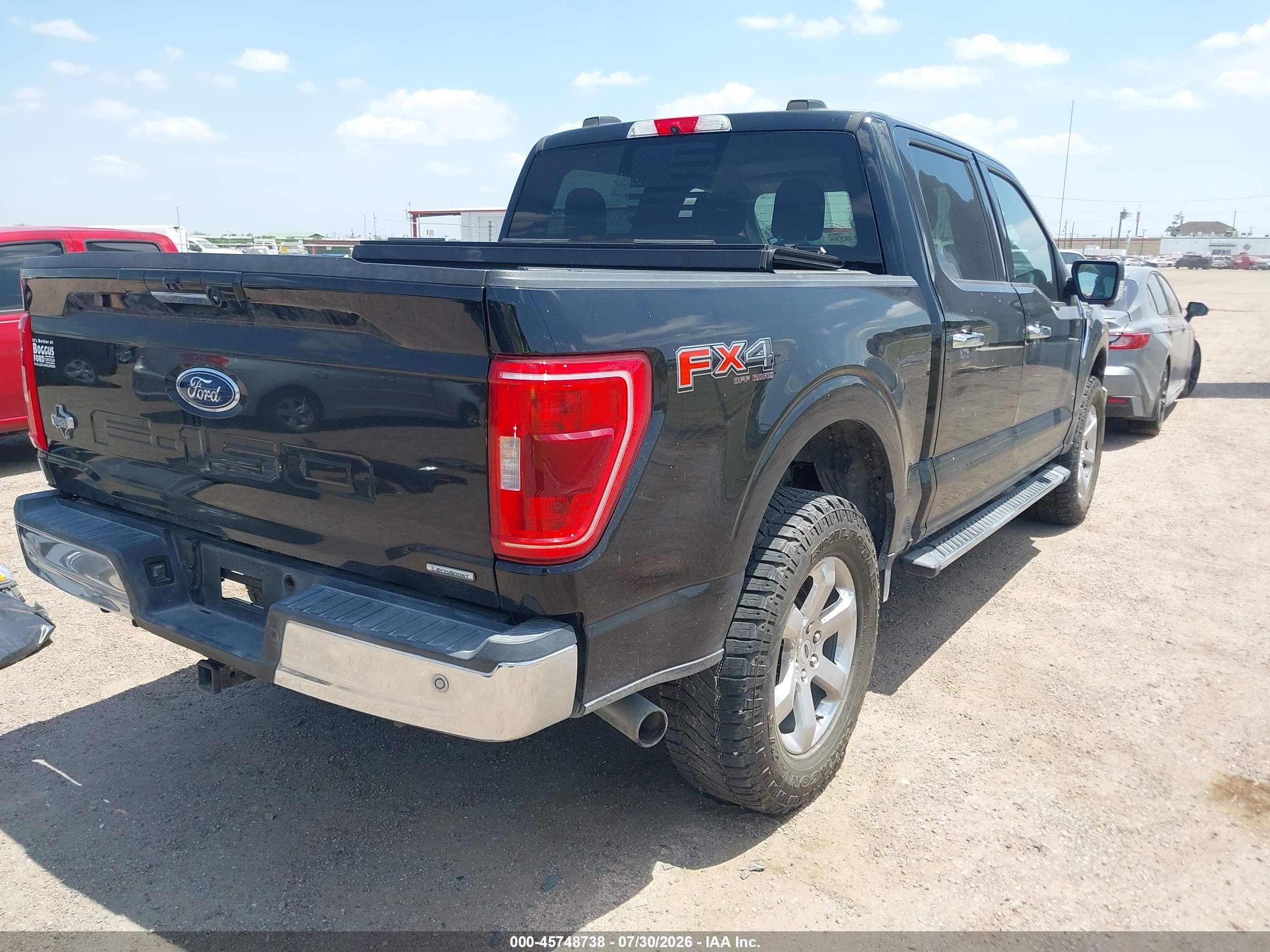 2021 Ford F-150 VIN 1FTFW1E84MFB36356 IAAI salvage auction — Side, Original (Texas), sold $9,900 on 2026-09-25 (photo 4)