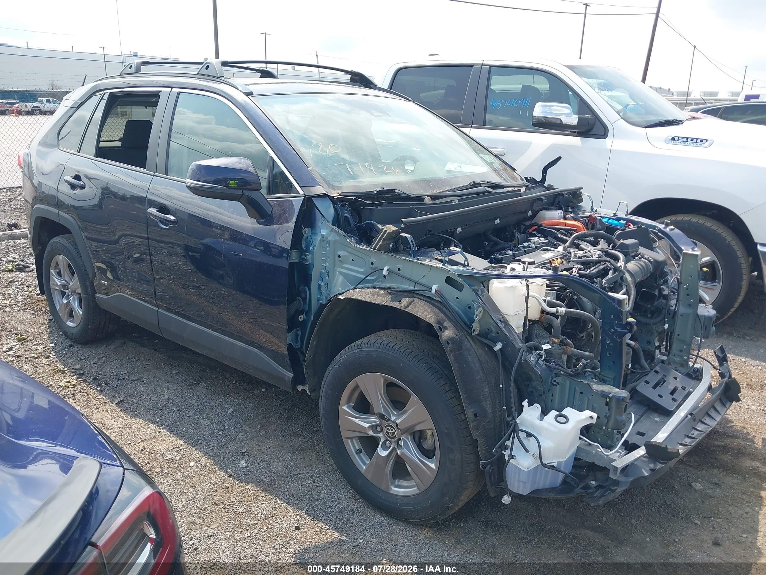 2023 Toyota RAV4 Hybrid VIN 4T3RWRFV3PU108129 — IAAI salvage auction photo