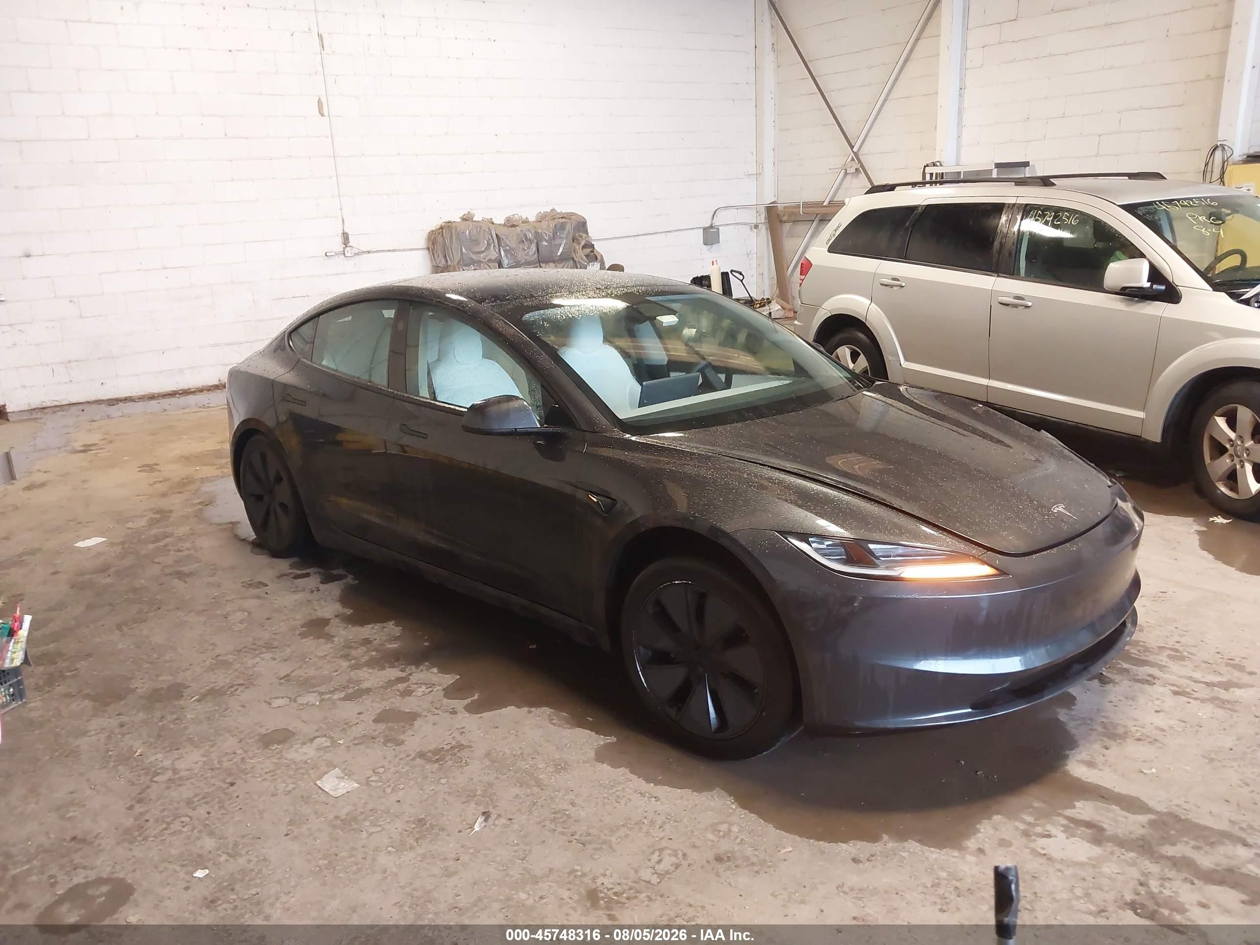 2025 Tesla Model 3 VIN 5YJ3E1EB1SF997707 — IAAI salvage auction photo
