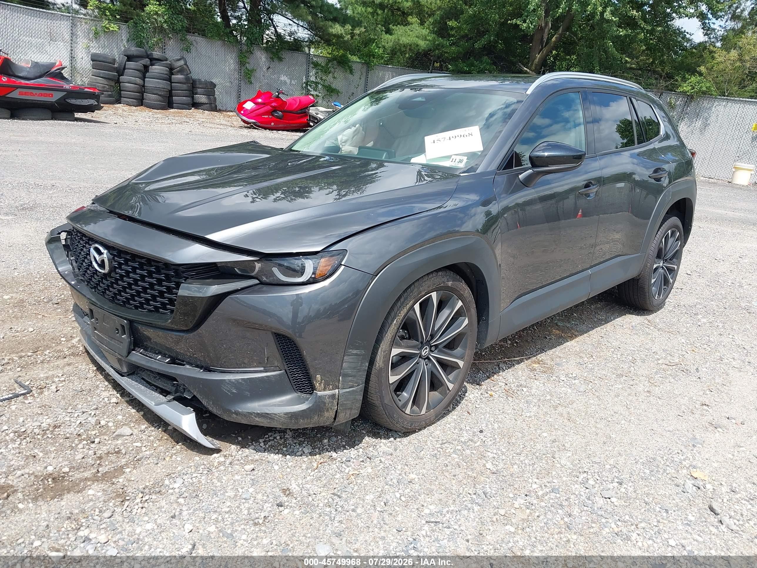 2025 Mazda CX-50 VIN 7MMVABDY8SN386560 IAAI salvage auction — Side, Salvage (Idaho), sold $6,925 on 2026-09-24 (photo 2)