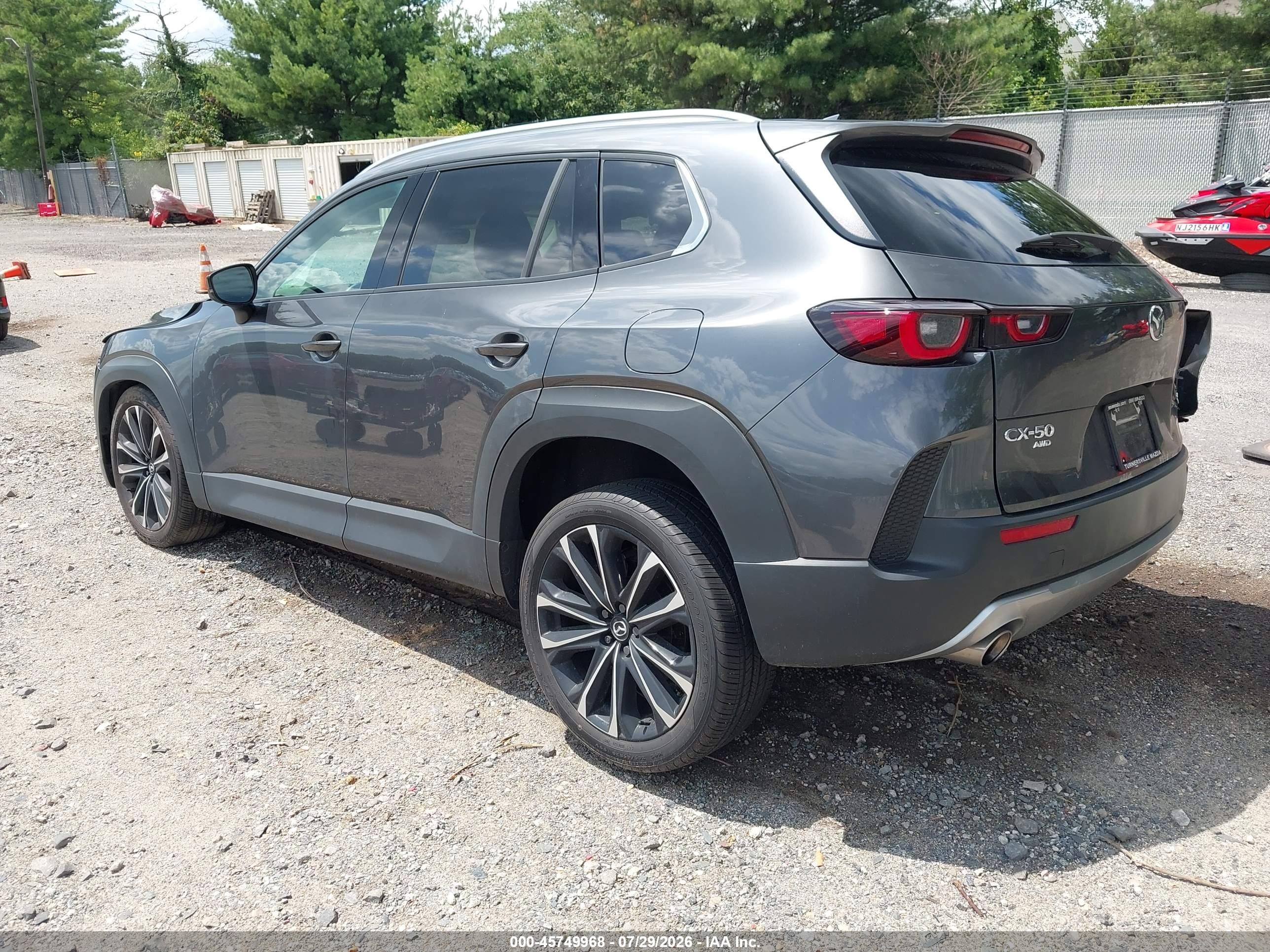 2025 Mazda CX-50 VIN 7MMVABDY8SN386560 IAAI salvage auction — Side, Salvage (Idaho), sold $6,925 on 2026-09-24 (photo 3)