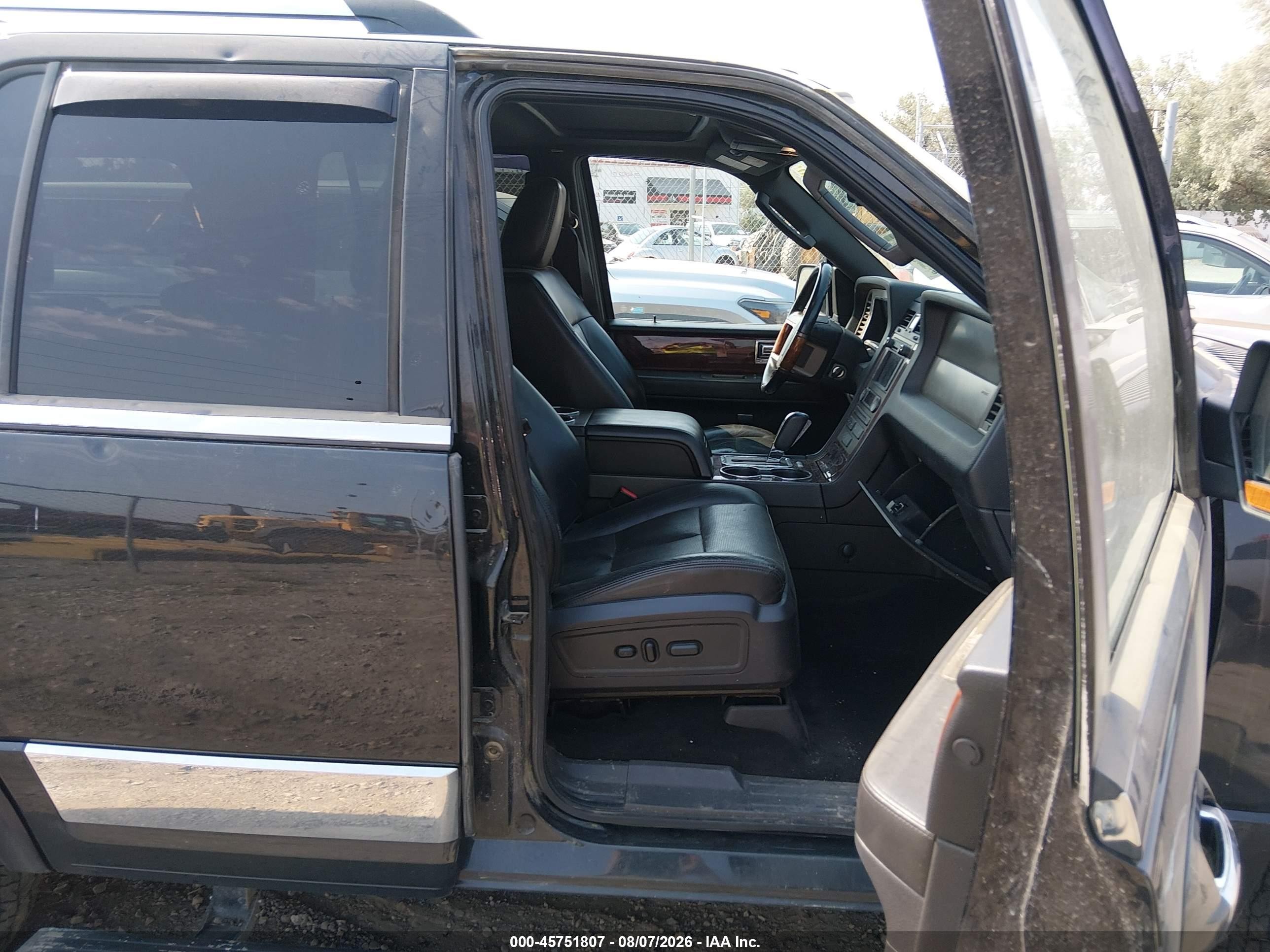 2011 Lincoln Navigator VIN 5LMJJ2J56BEJ03297 IAAI salvage auction — Hail, Clear (Montana), sold $975 on 2026-09-12 (photo 5)