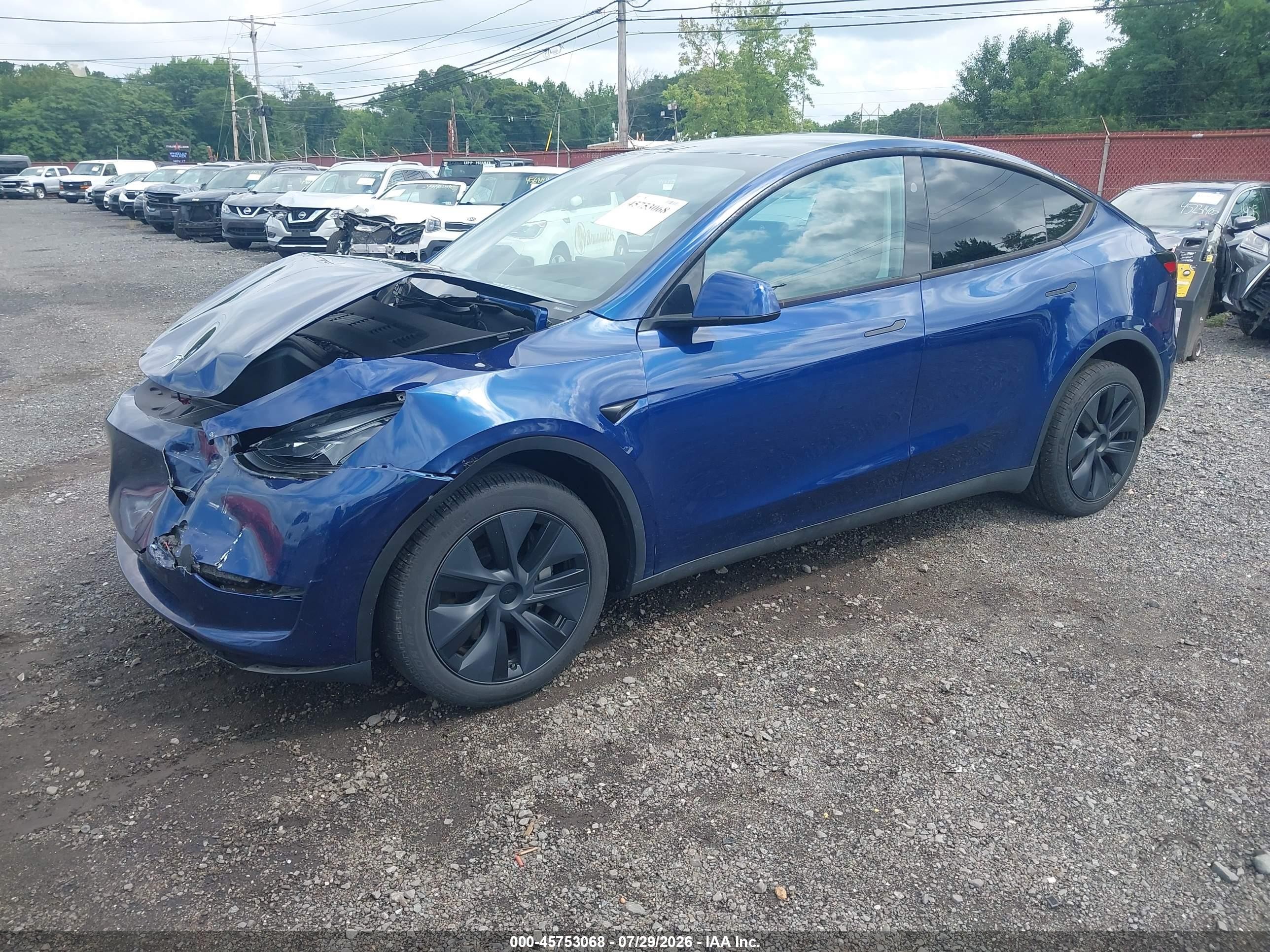 2024 Tesla Model Y VIN 7SAYGDEE0RA305457 IAAI salvage auction — Front End, Salvage (Idaho), sold $16,700 on 2026-09-13 (photo 2)