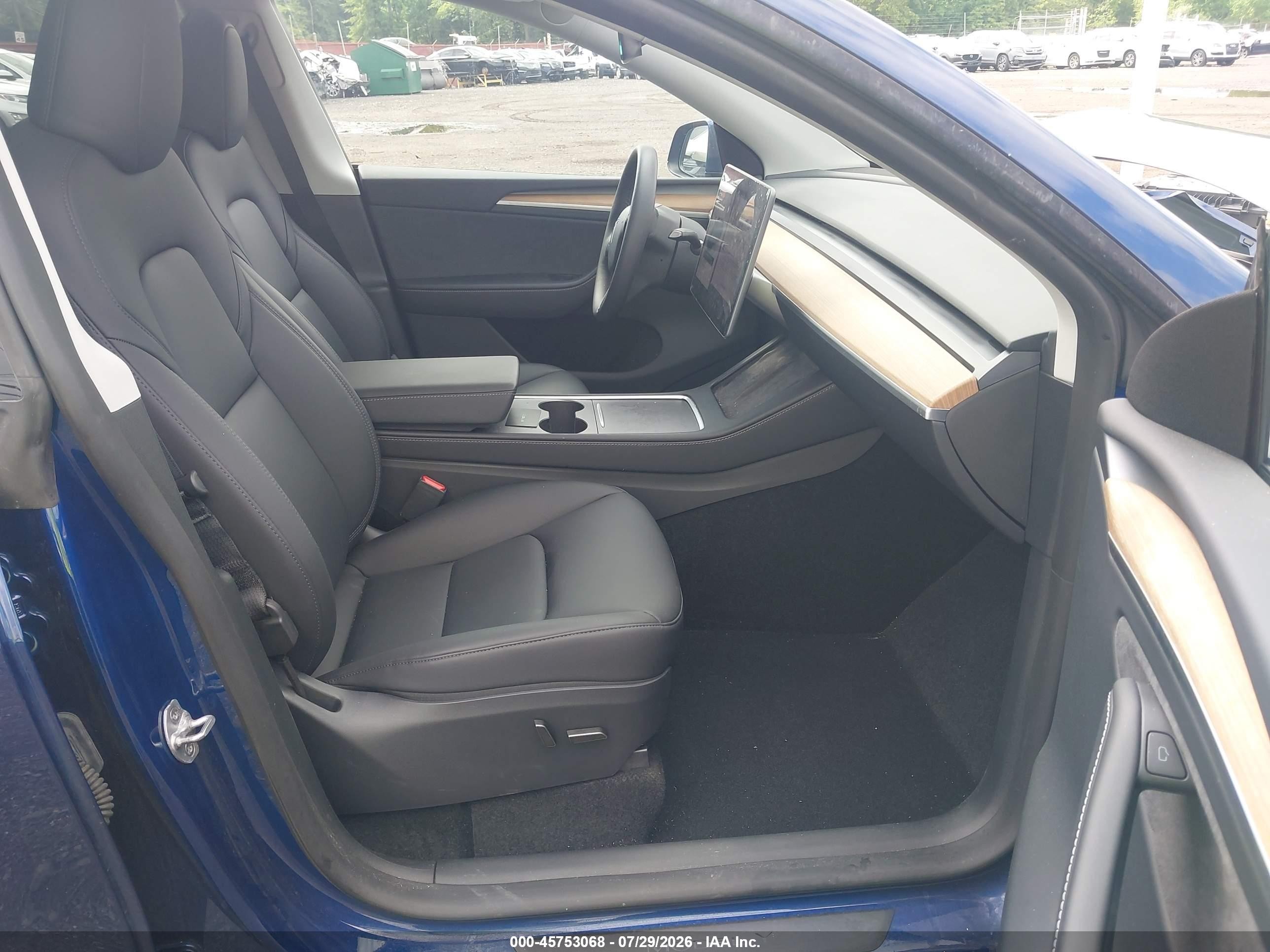 2024 Tesla Model Y VIN 7SAYGDEE0RA305457 IAAI salvage auction — Front End, Salvage (Idaho), sold $16,700 on 2026-09-13 (photo 5)