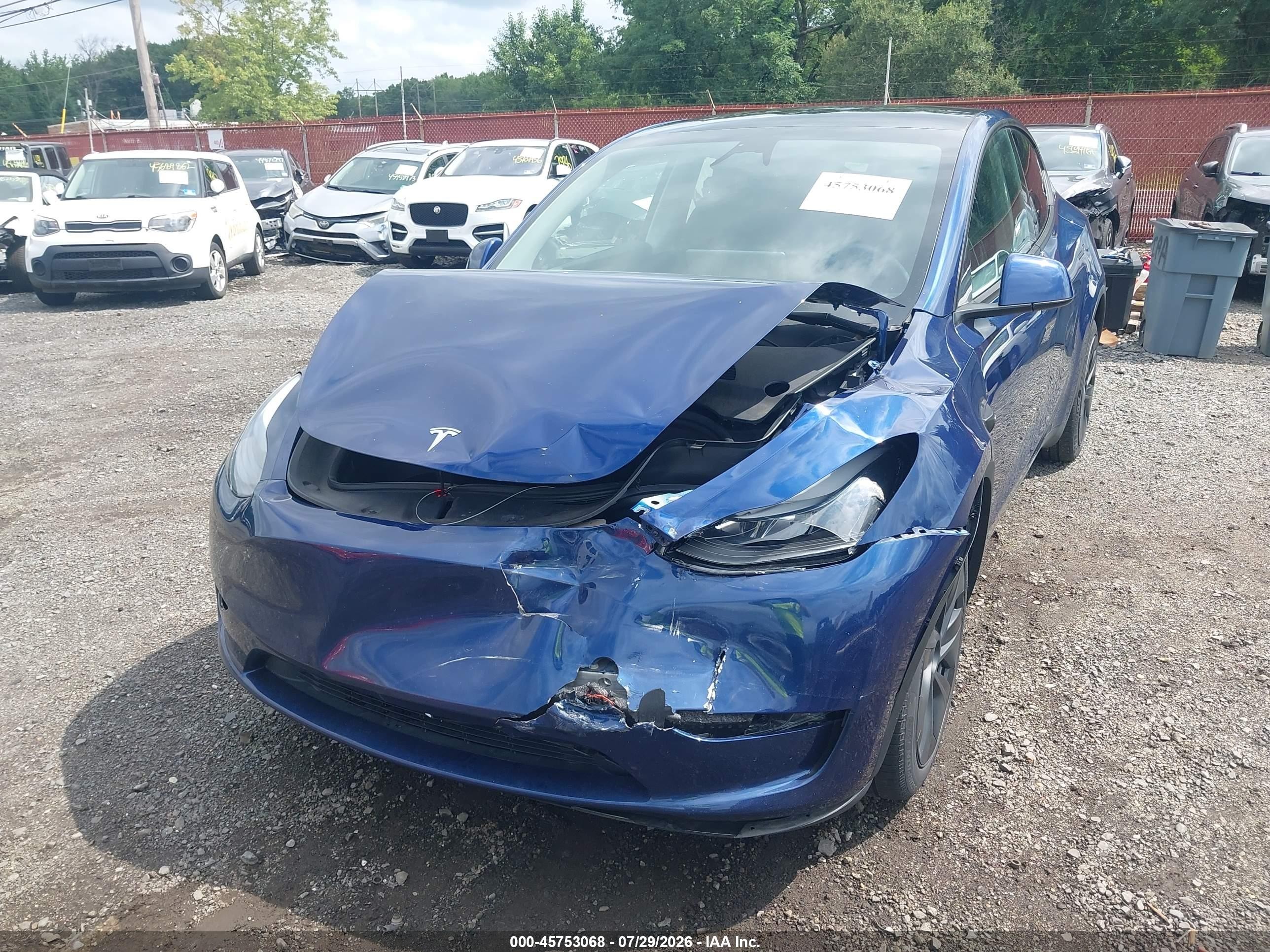 2024 Tesla Model Y VIN 7SAYGDEE0RA305457 IAAI salvage auction — Front End, Salvage (Idaho), sold $16,700 on 2026-09-13 (photo 6)