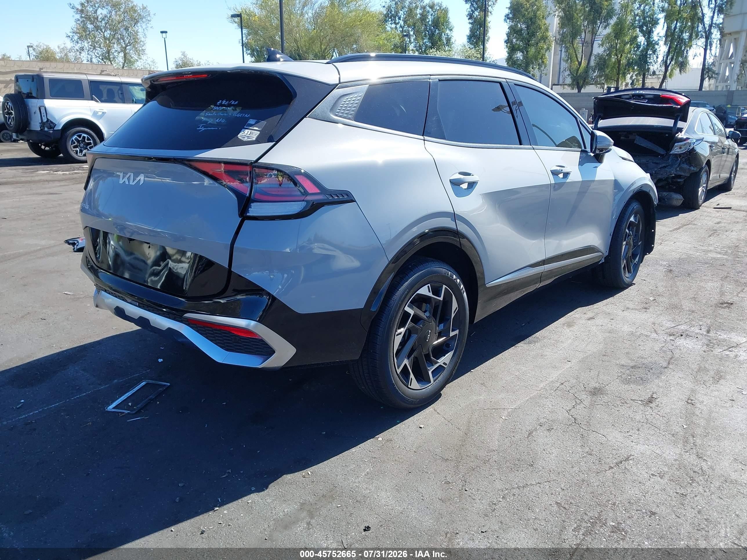 2023 Kia Sportage VIN 5XYK53AFXPG088672 IAAI salvage auction — Front End, Salvage Certificate (California), sold $3,550 on 2026-09-13 (photo 4)
