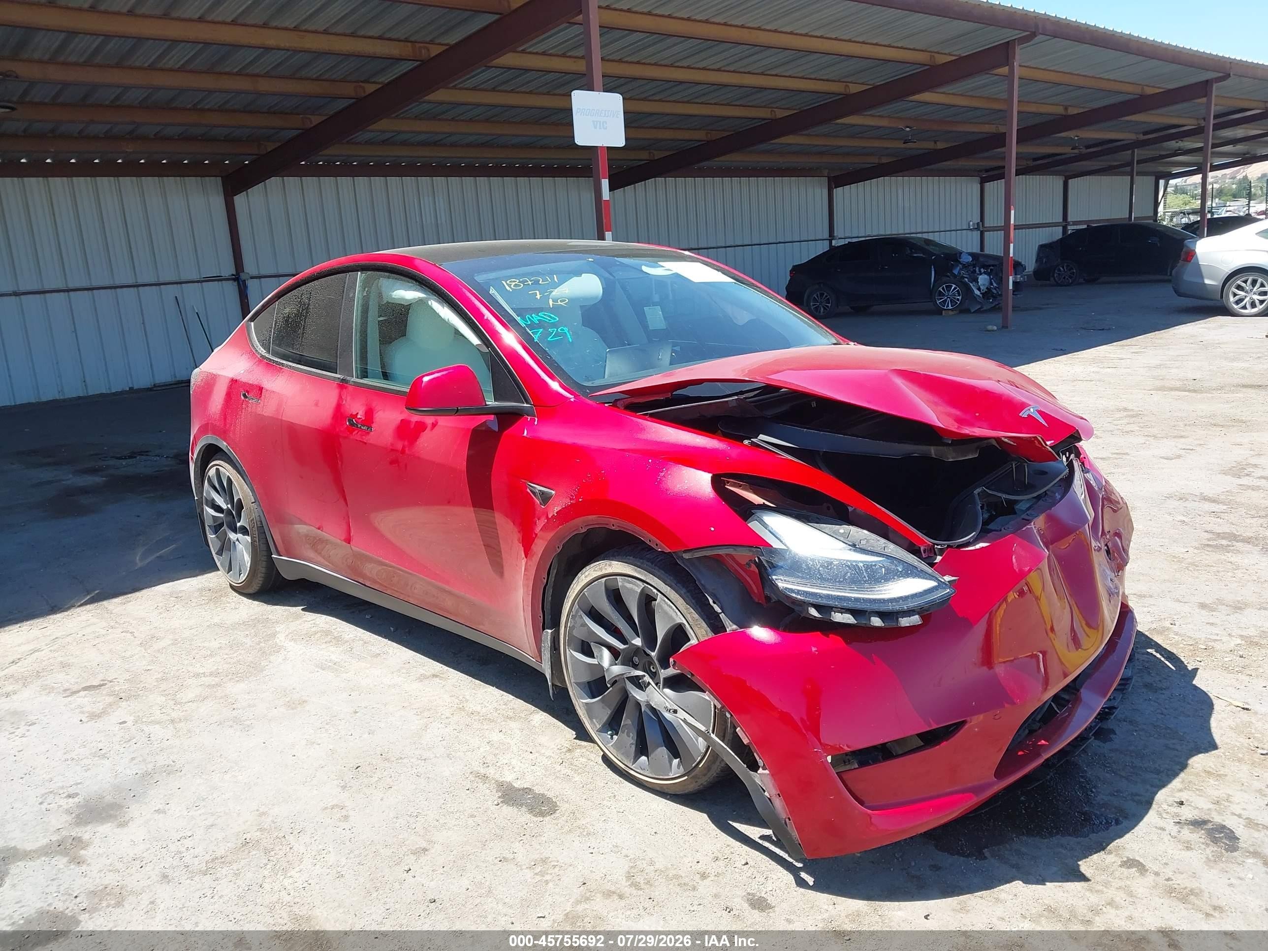 2023 Tesla Model Y VIN 7SAYGDEF7PF740324 — IAAI salvage auction photo