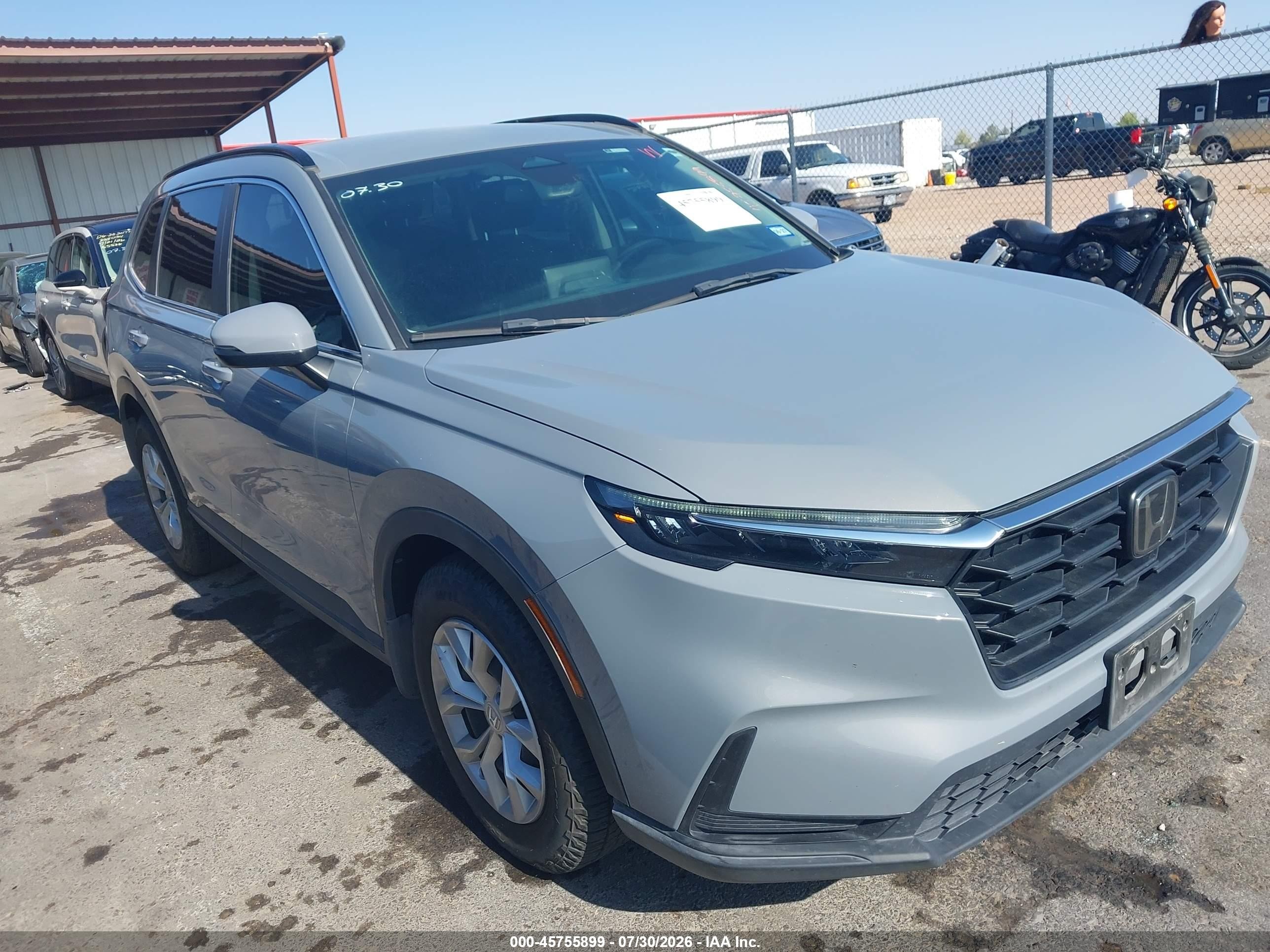 2023 Honda CR-V VIN 2HKRS3H25PH308822 — IAAI salvage auction photo