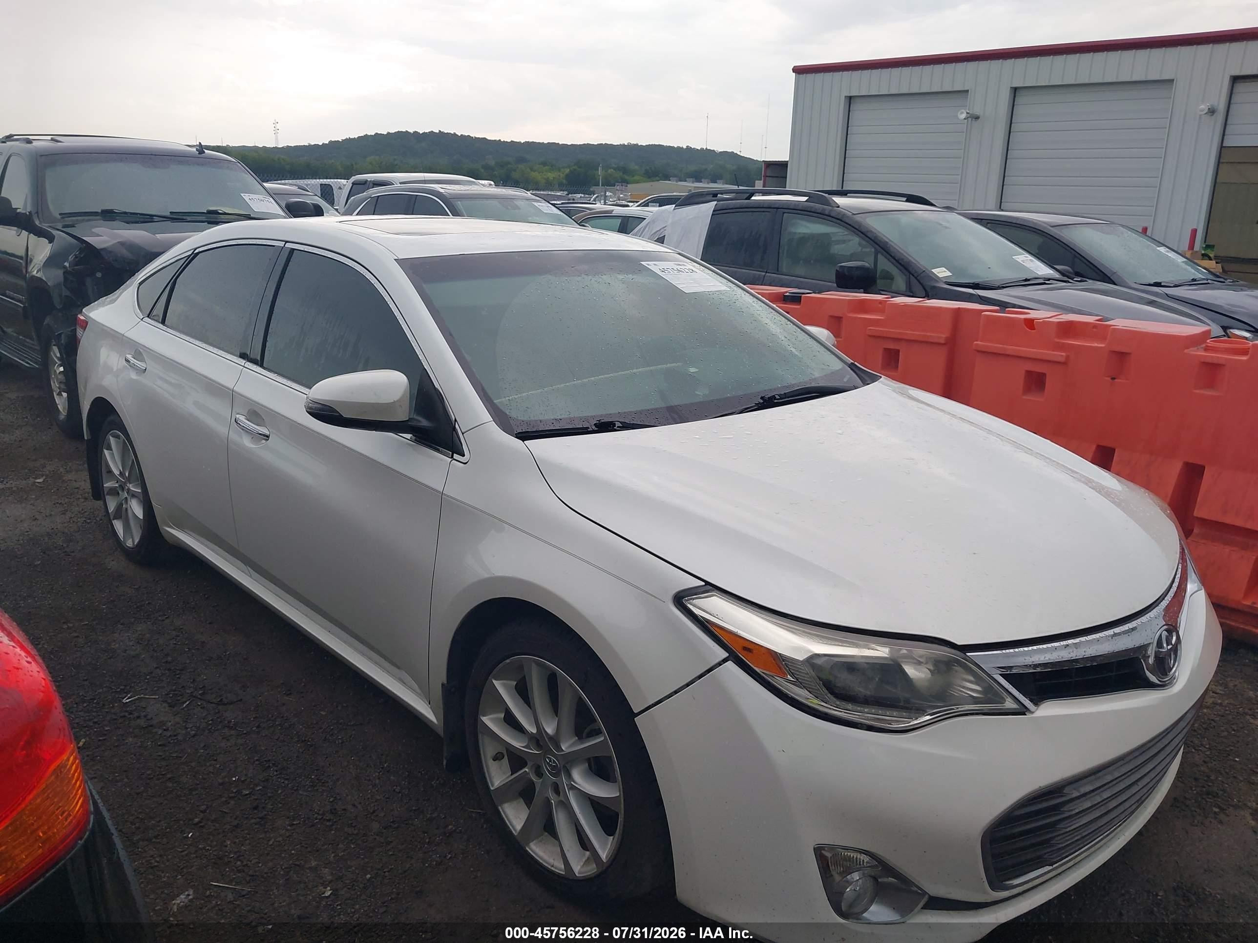 2013 Toyota Avalon VIN 4T1BK1EB0DU040270 — IAAI salvage auction photo