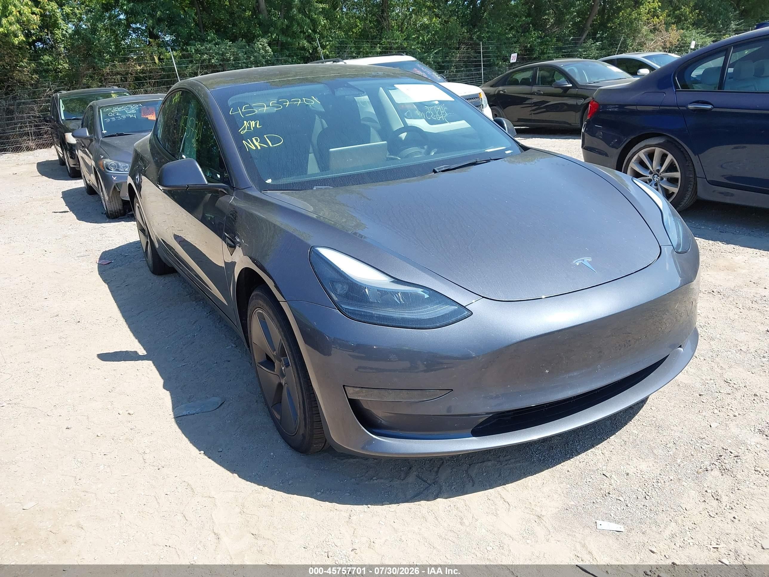 2023 Tesla Model 3 VIN 5YJ3E1EA2PF711507 — IAAI salvage auction photo