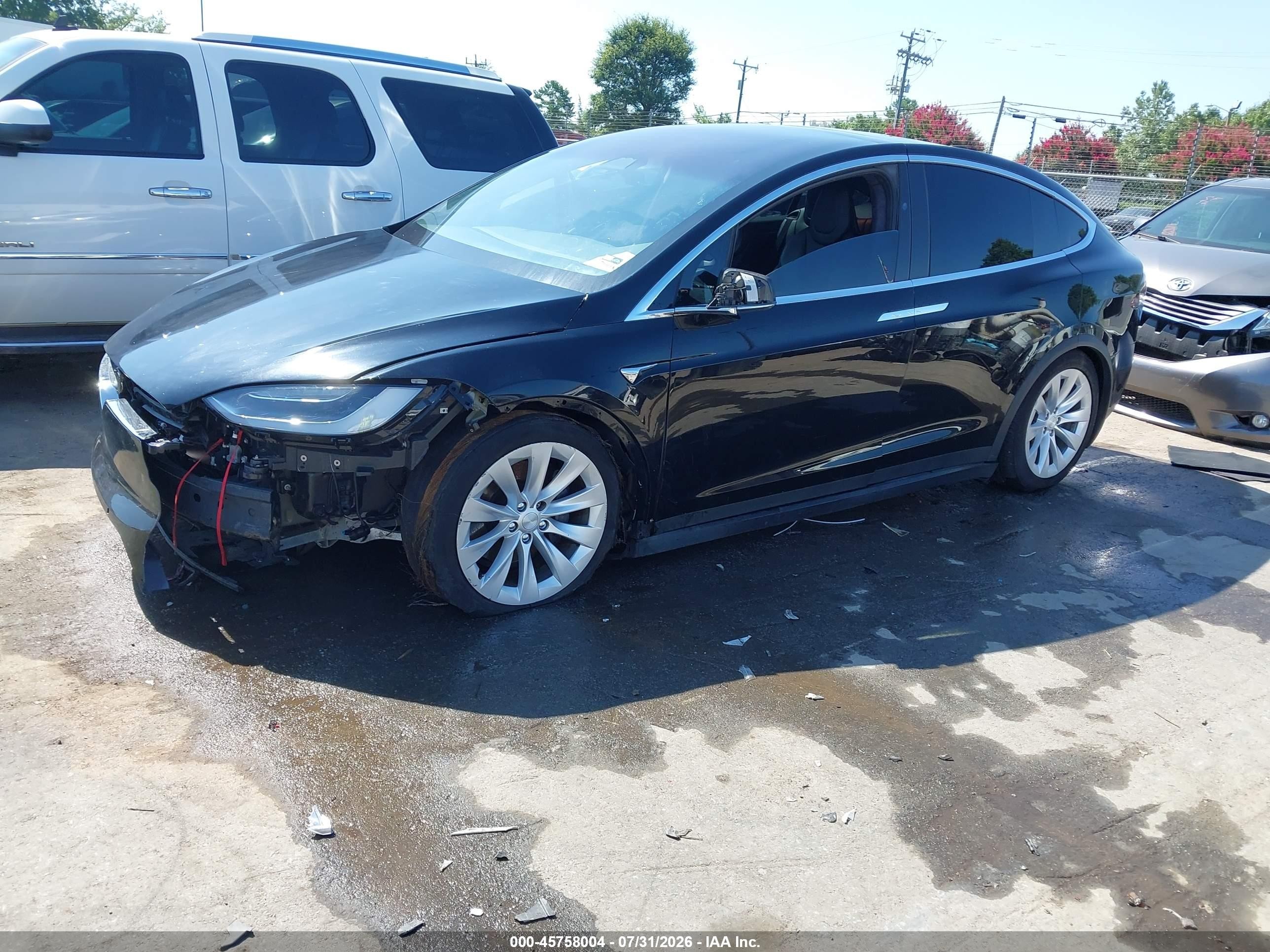 2017 Tesla Model x VIN 5YJXCAE2XHF077364 IAAI salvage auction — Unknown, Salvage (North Carolina), sold $5,200 on 2026-09-12 (photo 2)