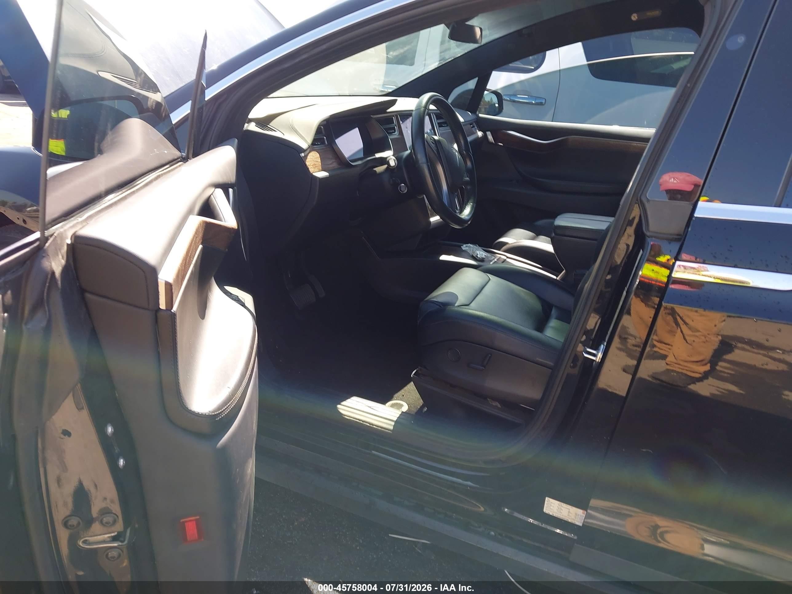 2017 Tesla Model x VIN 5YJXCAE2XHF077364 IAAI salvage auction — Unknown, Salvage (North Carolina), sold $5,200 on 2026-09-12 (photo 5)