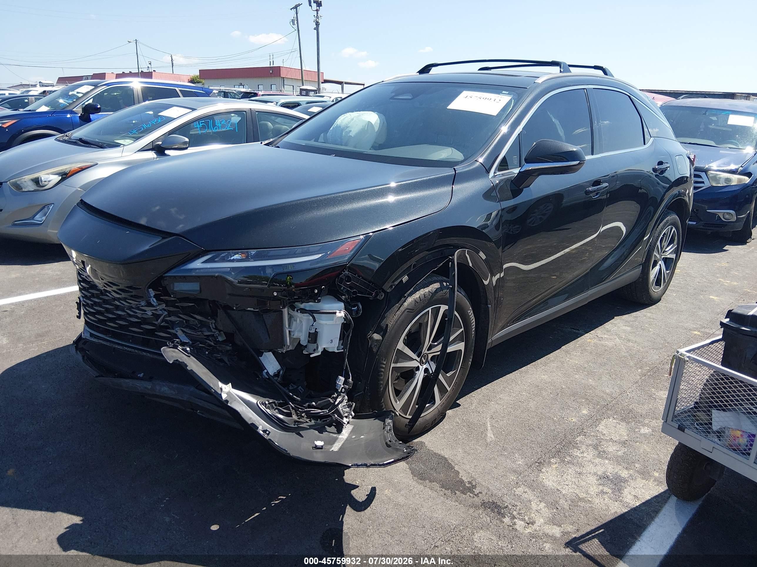2025 Lexus Rx VIN JTJCHMAA0S2031984 IAAI salvage auction — Front End, Clear (Tennessee), sold $18,900 on 2026-09-12 (photo 2)