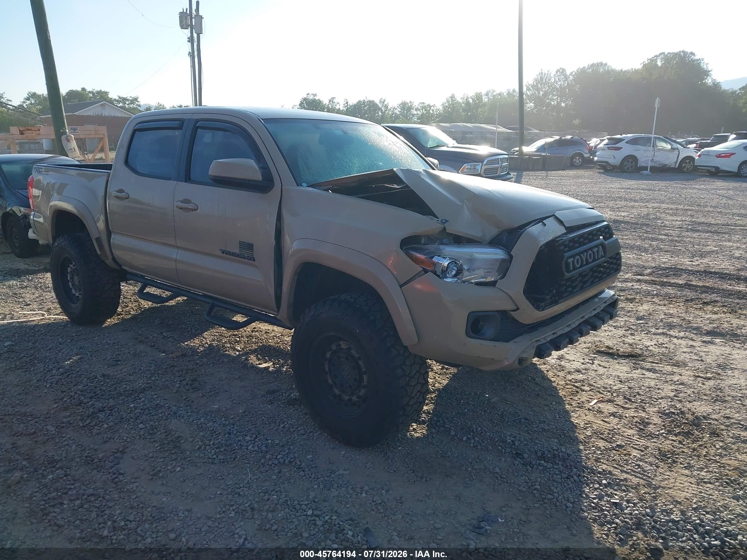 2017 Toyota Tacoma VIN 3TMAZ5CN9HM043940 — IAAI salvage auction photo