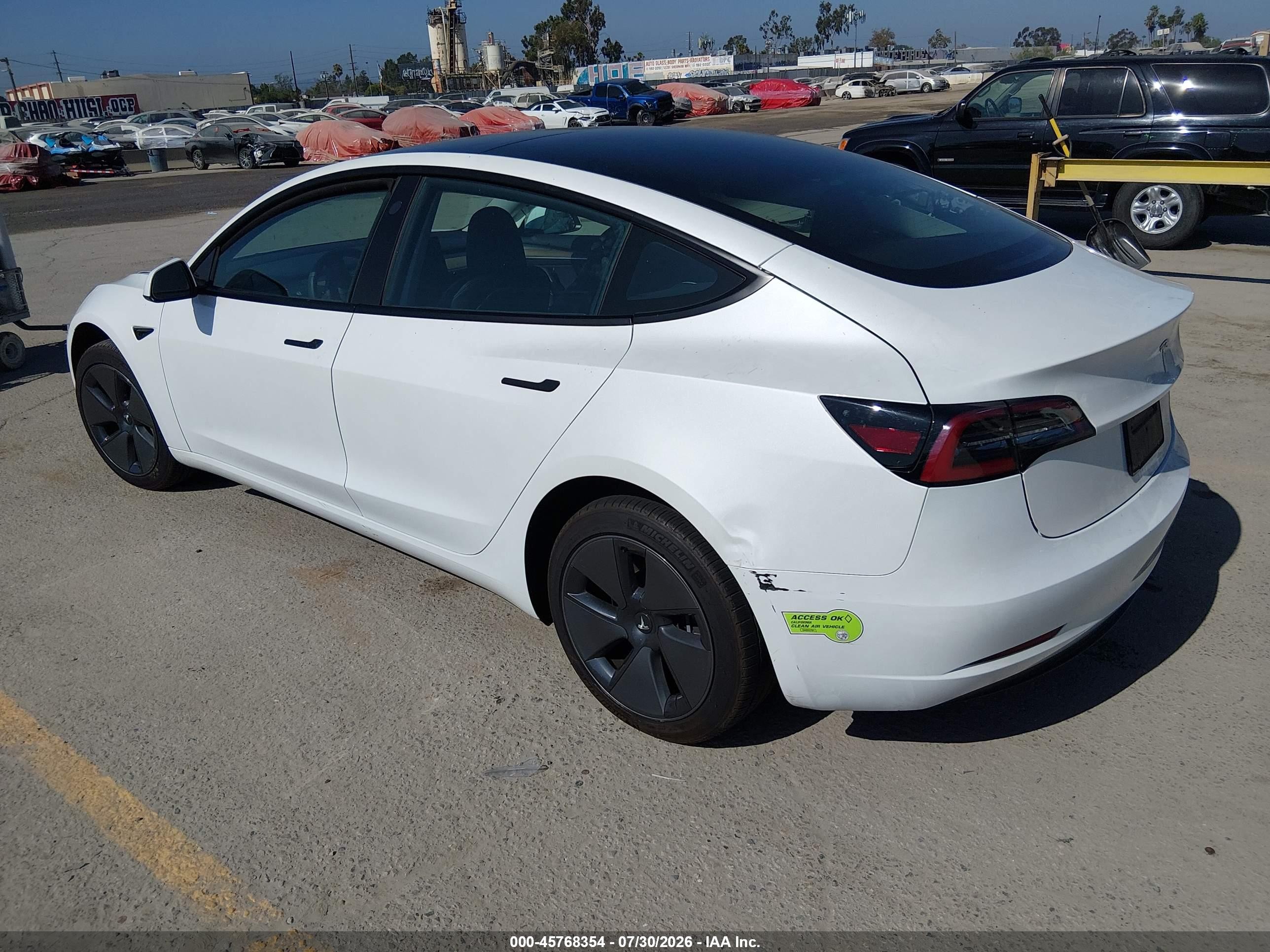 2023 Tesla Model 3 VIN 5YJ3E1EA0PF568203 IAAI salvage auction — Unknown, Salvage (California), sold $7,400 on 2026-09-07 (photo 3)