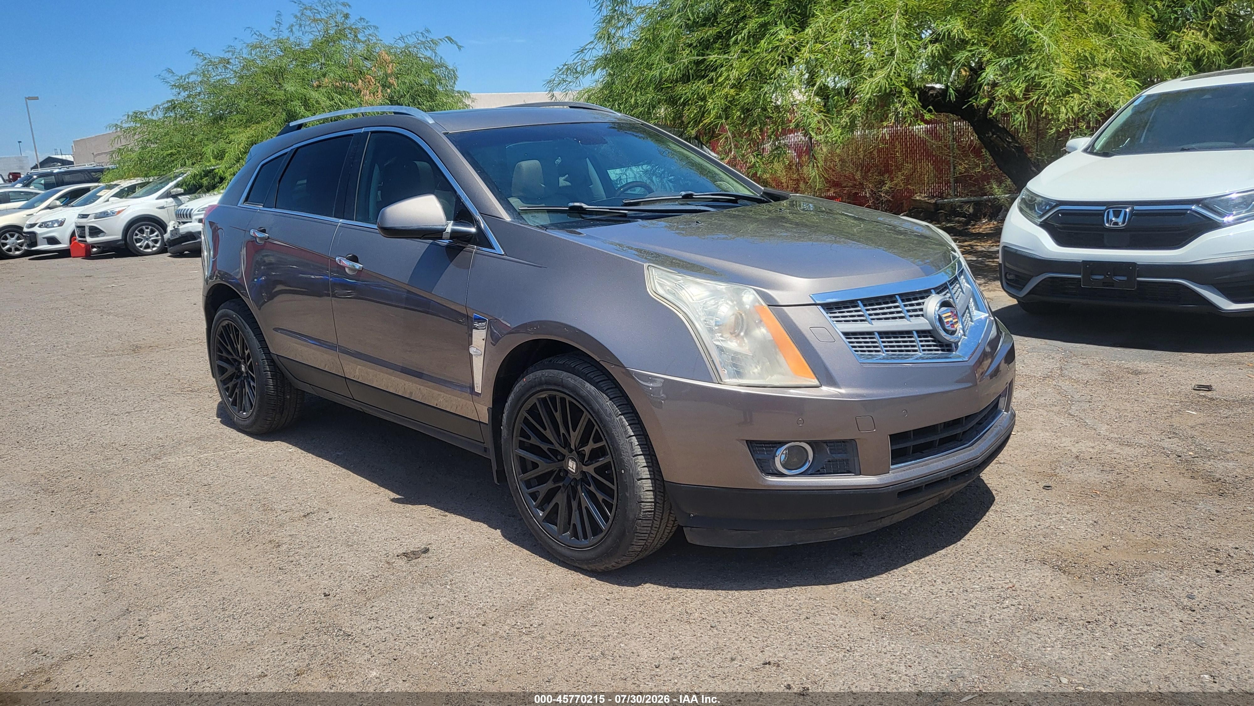 2011 Cadillac Srx VIN 3GYFNFEY5BS540978 IAAI salvage auction — Normal Wear, Clear (Arizona), sold $800 on 2026-09-01 (photo 1)
