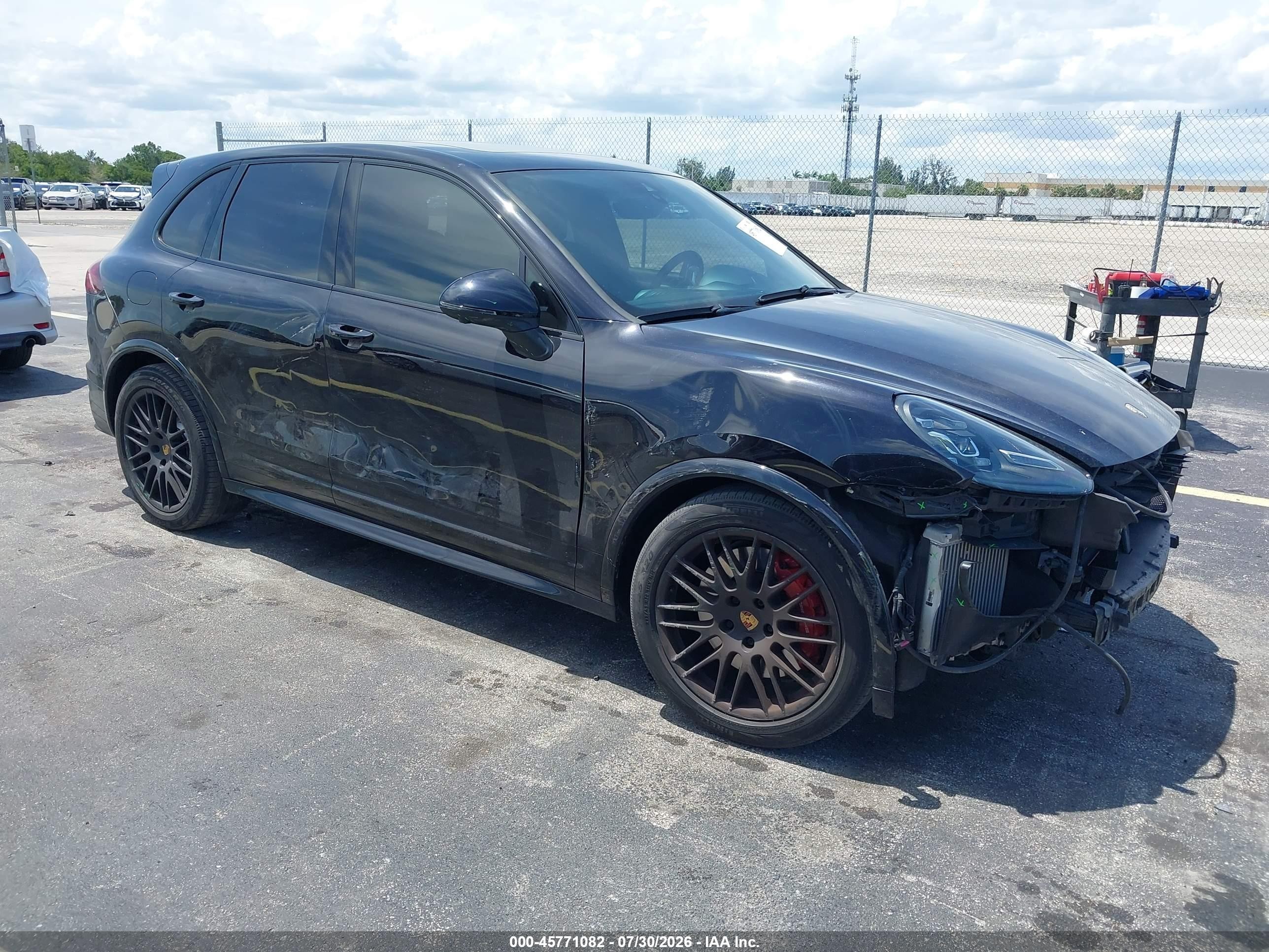2016 Porsche Cayenne VIN WP1AD2A27GLA72731 — IAAI salvage auction photo