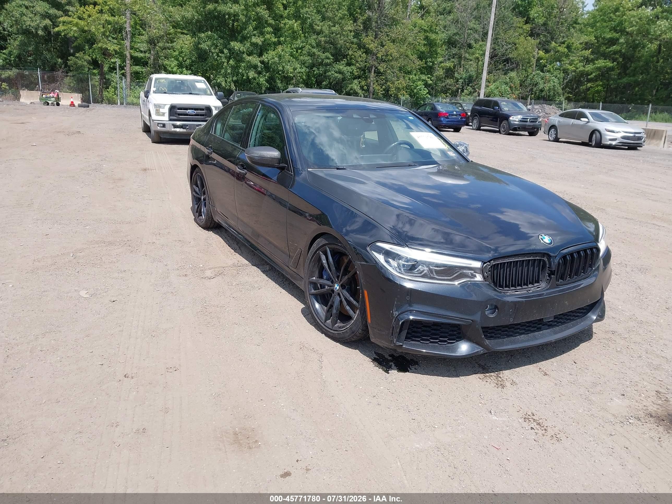 2018 BMW M550i xDrive VIN WBAJB9C59JB049453 — IAAI salvage auction photo