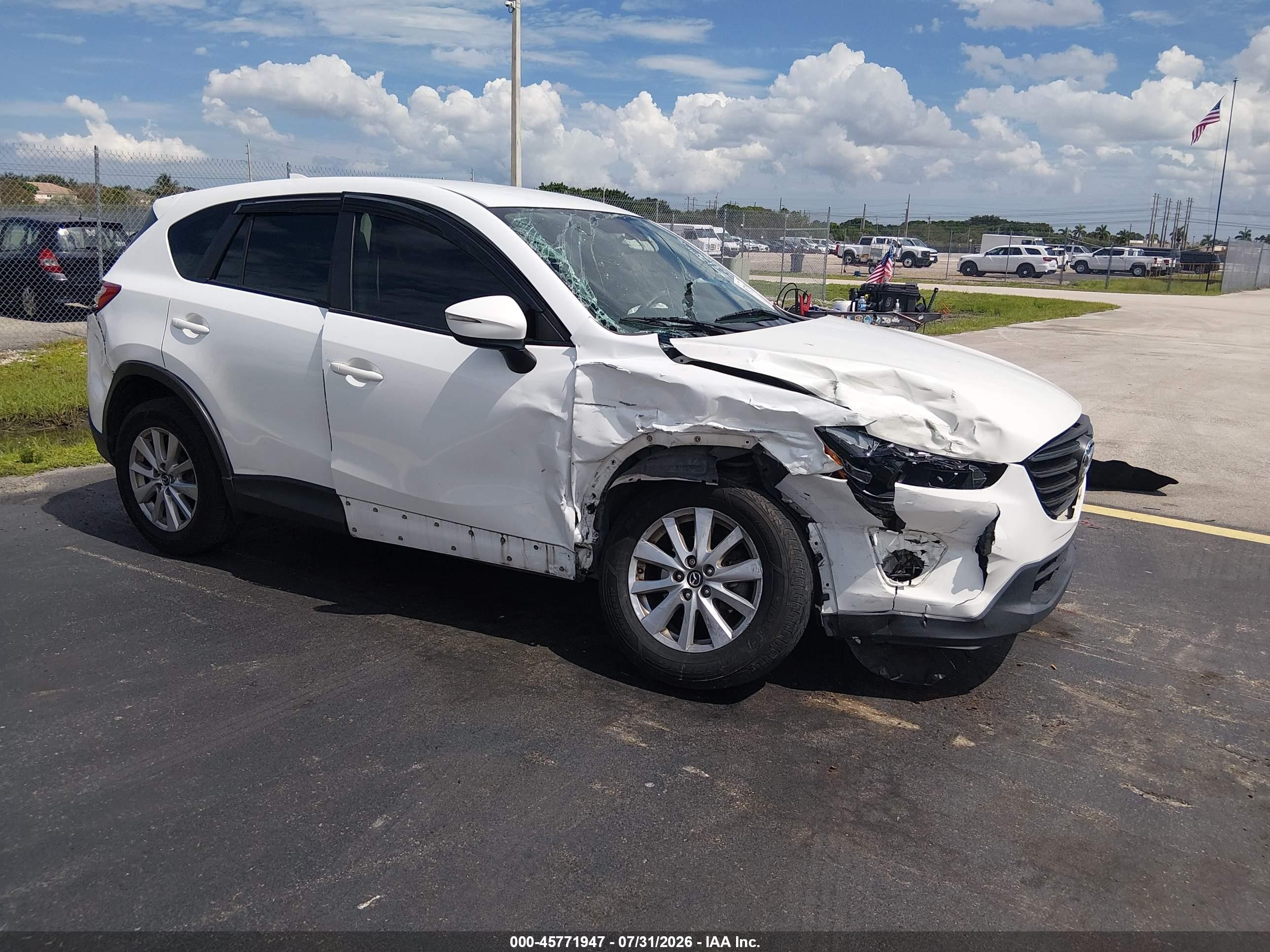 2016 Mazda CX-5 VIN JM3KE2BY9G0689093 IAAI salvage auction — Side, Rebuildable (Florida), sold $1,400 on 2026-09-14 (photo 1)